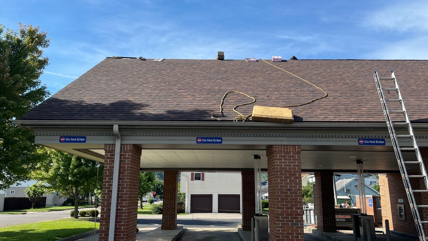 Commercial Roofing Installation using Performance Shingles by Mr. Roofer
