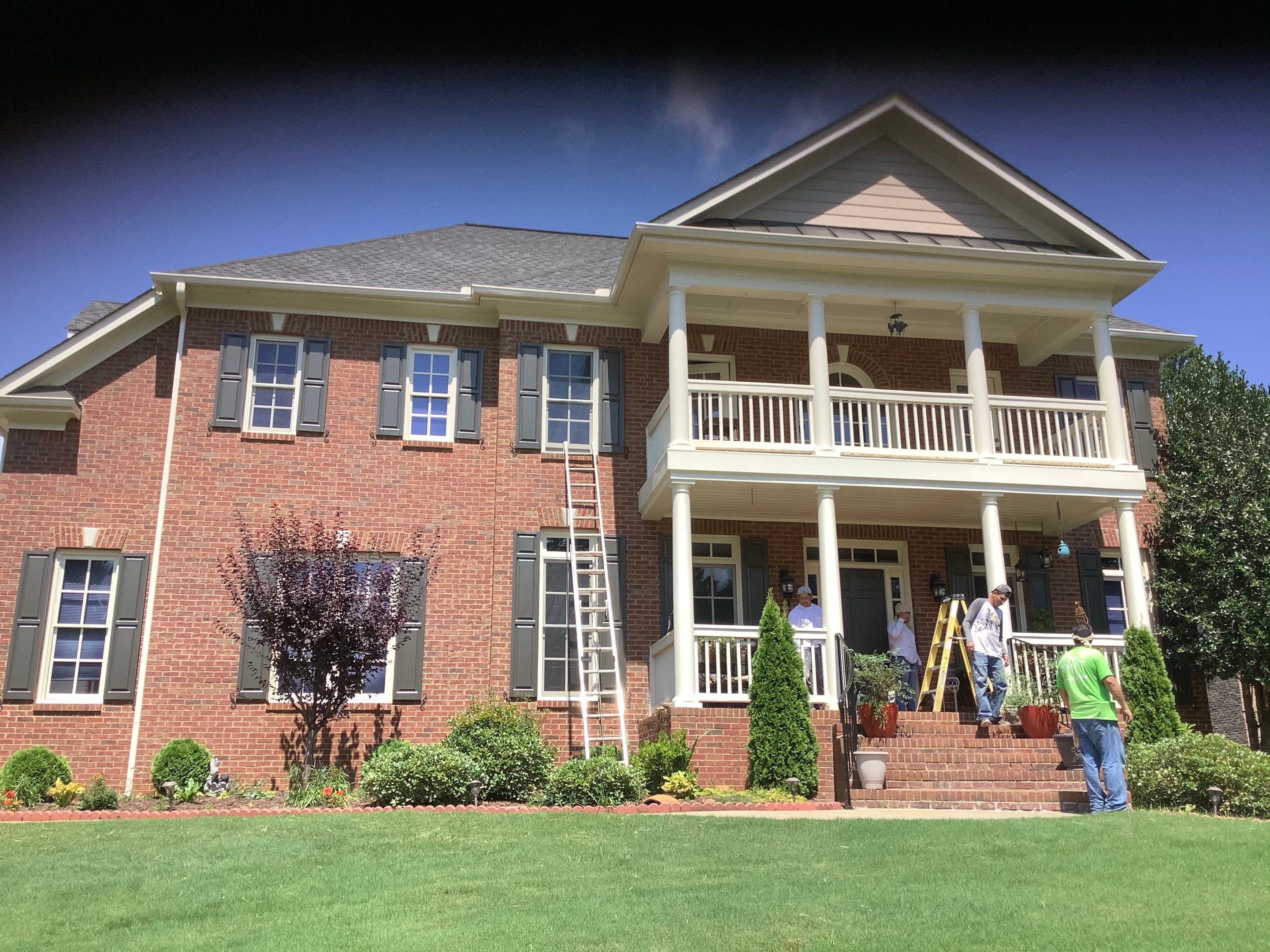 Exterior Trim and Siding Painting for Cumming Red Brick Home by Swift Home Renovations