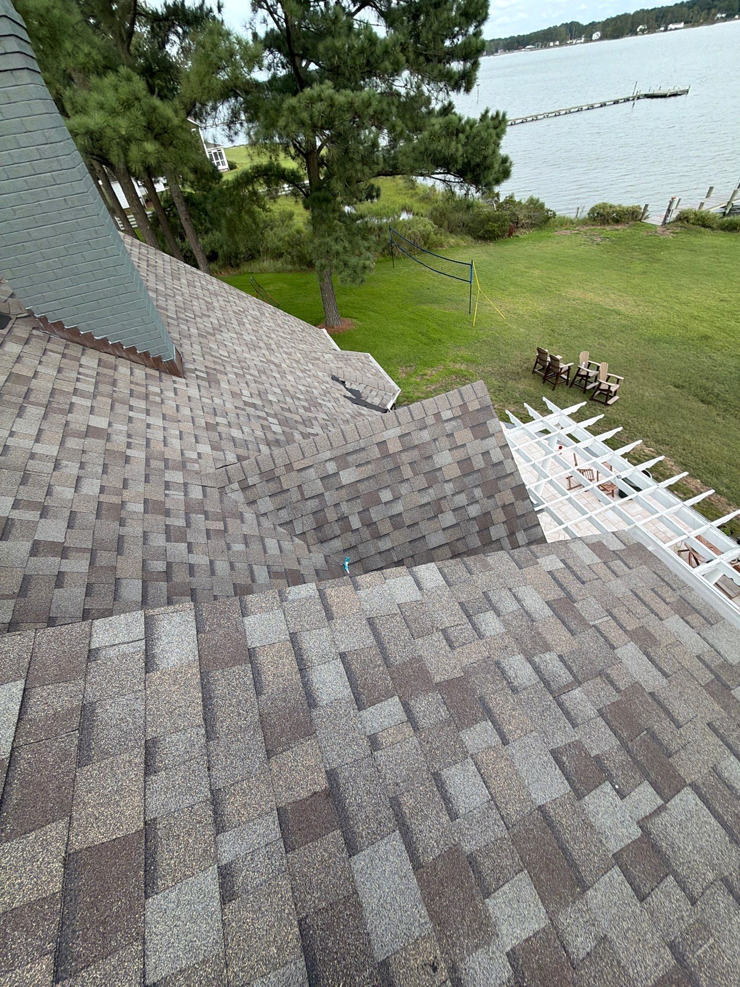 Roof Replacement and White Gutter Installation in Gloucester by Cade Construction