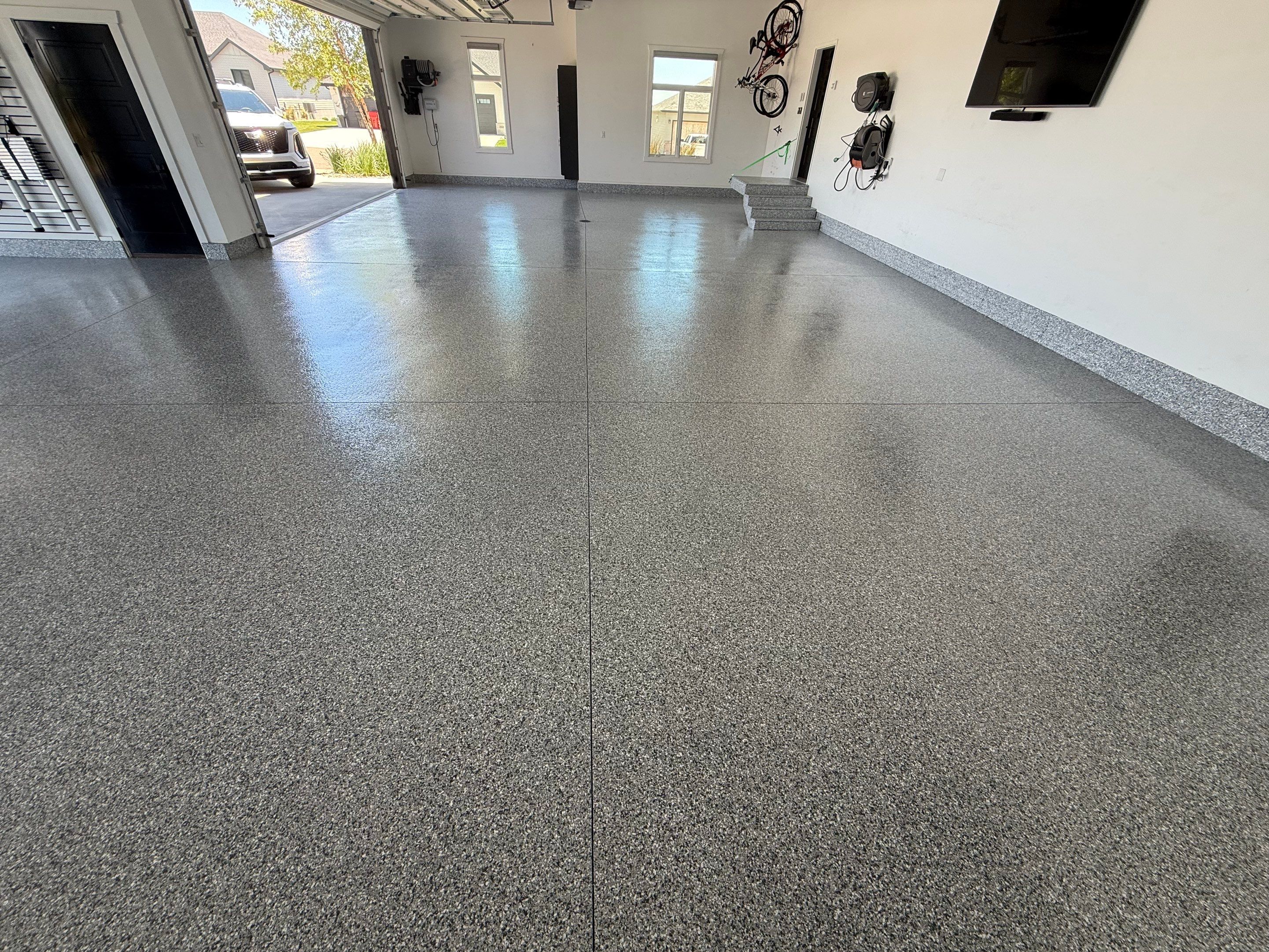 Gravel Flake Garage Floor Coating in Yankton by Select Painting, Coatings & Garage Cabinets