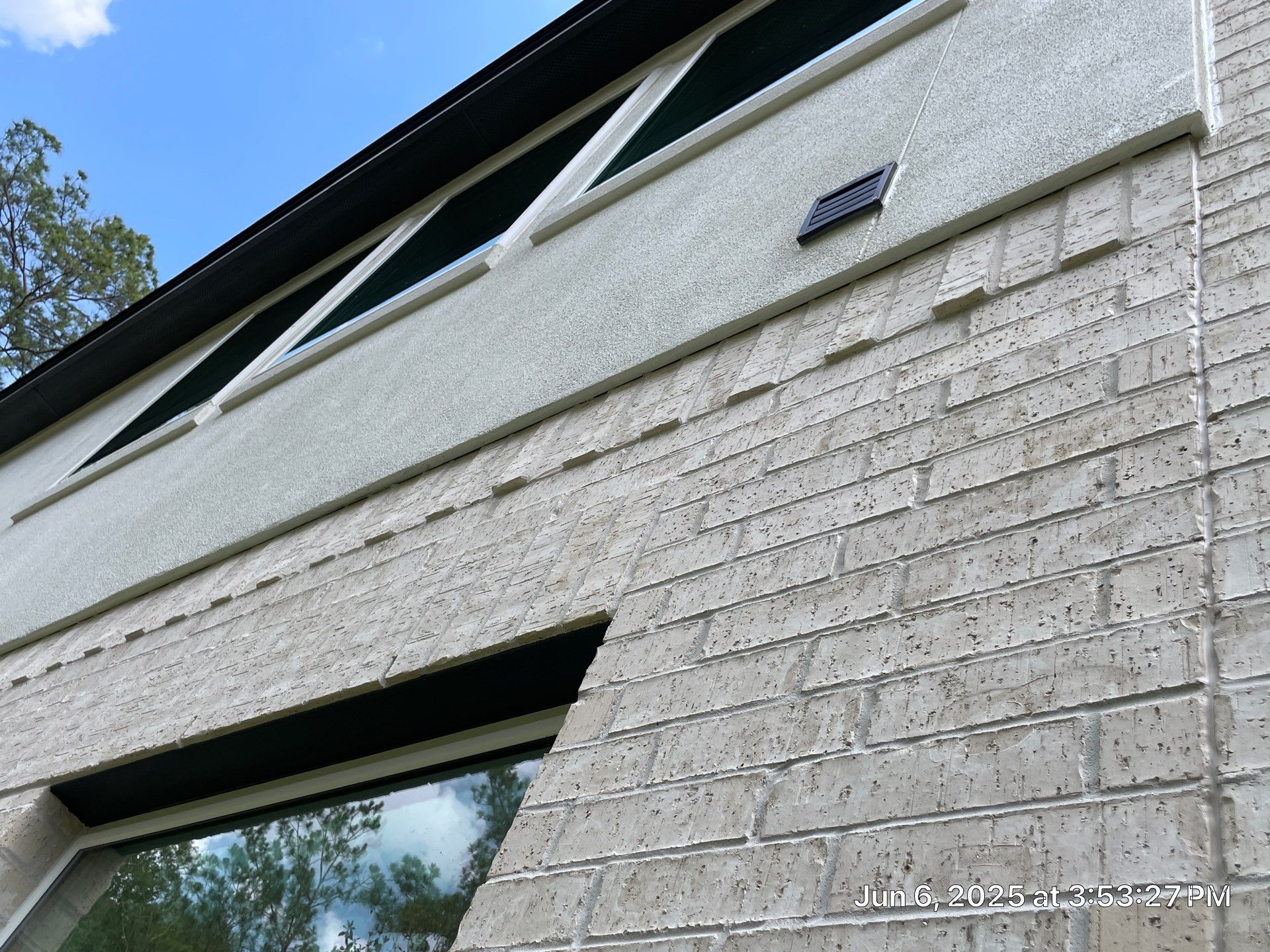Conroe Harmony: Sand Finish Stucco with Natural Stone Accents by Apex Conventional Stucco Llc