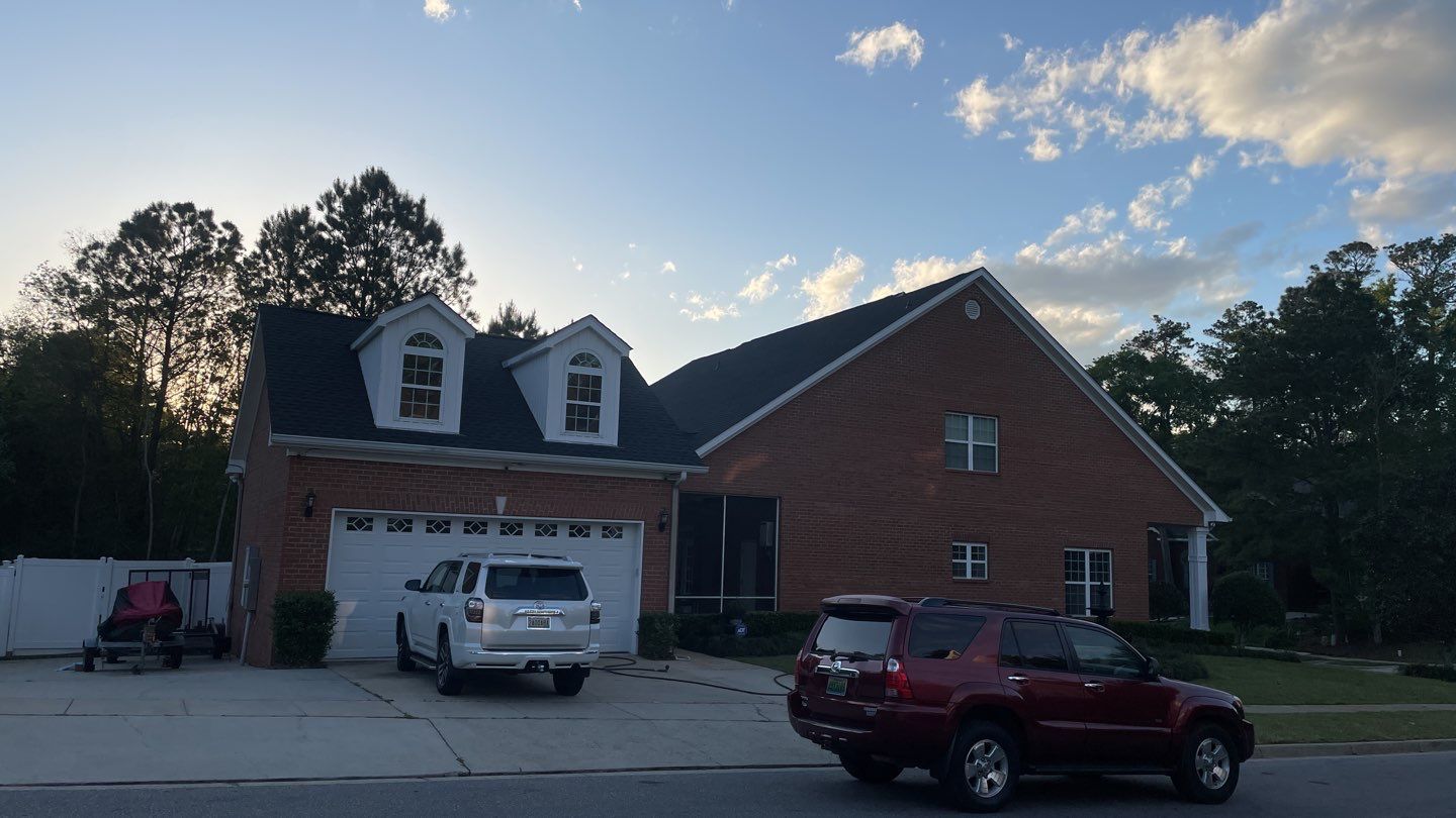 Residential Roofing Installation using Roof Replacement by American Roofing & Construction LLC
