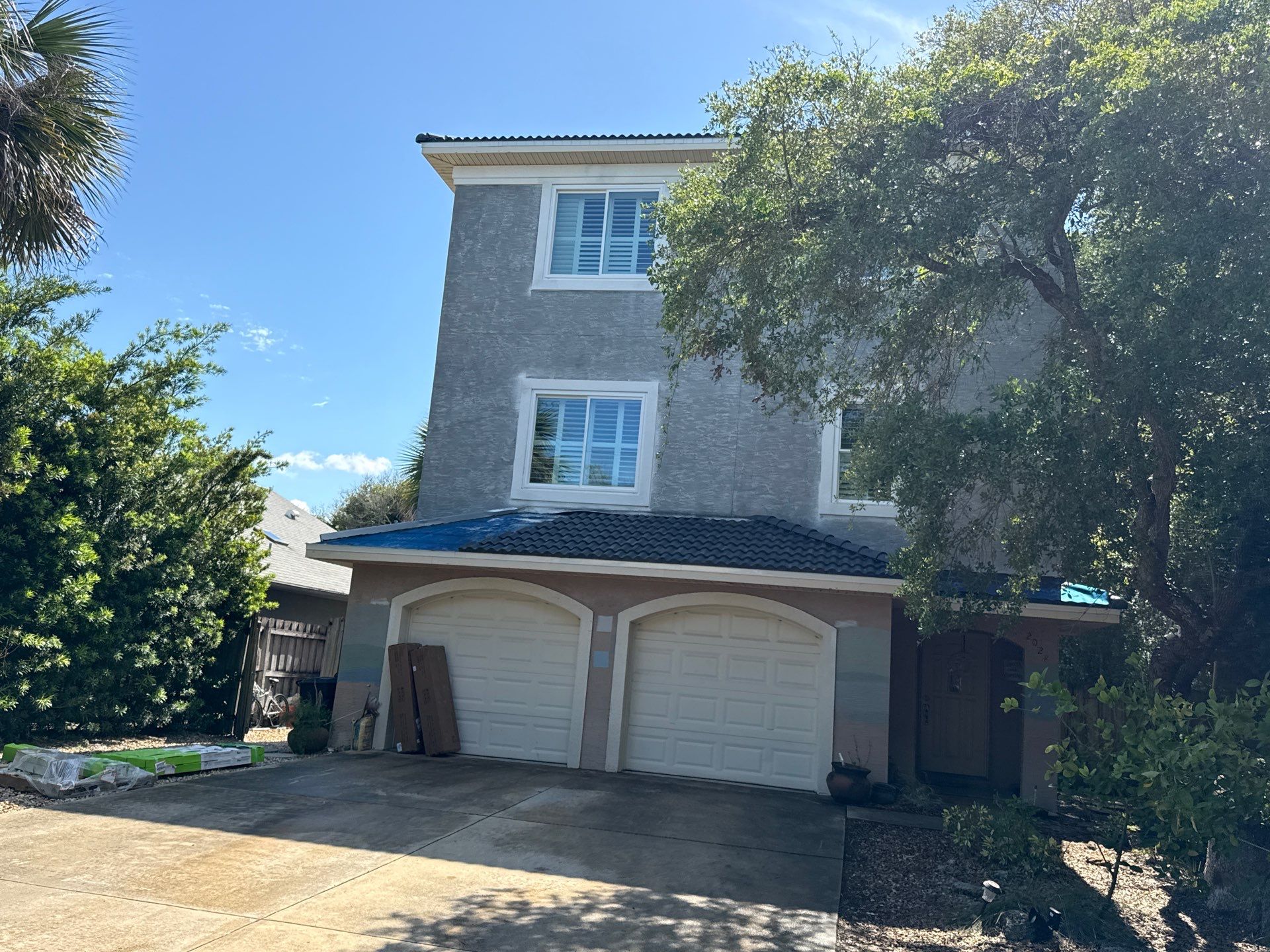Flagler Beach Residential Tile Roof Replacement with Dark Barrel Tiles by Fortified Roofing Solutions Corp.