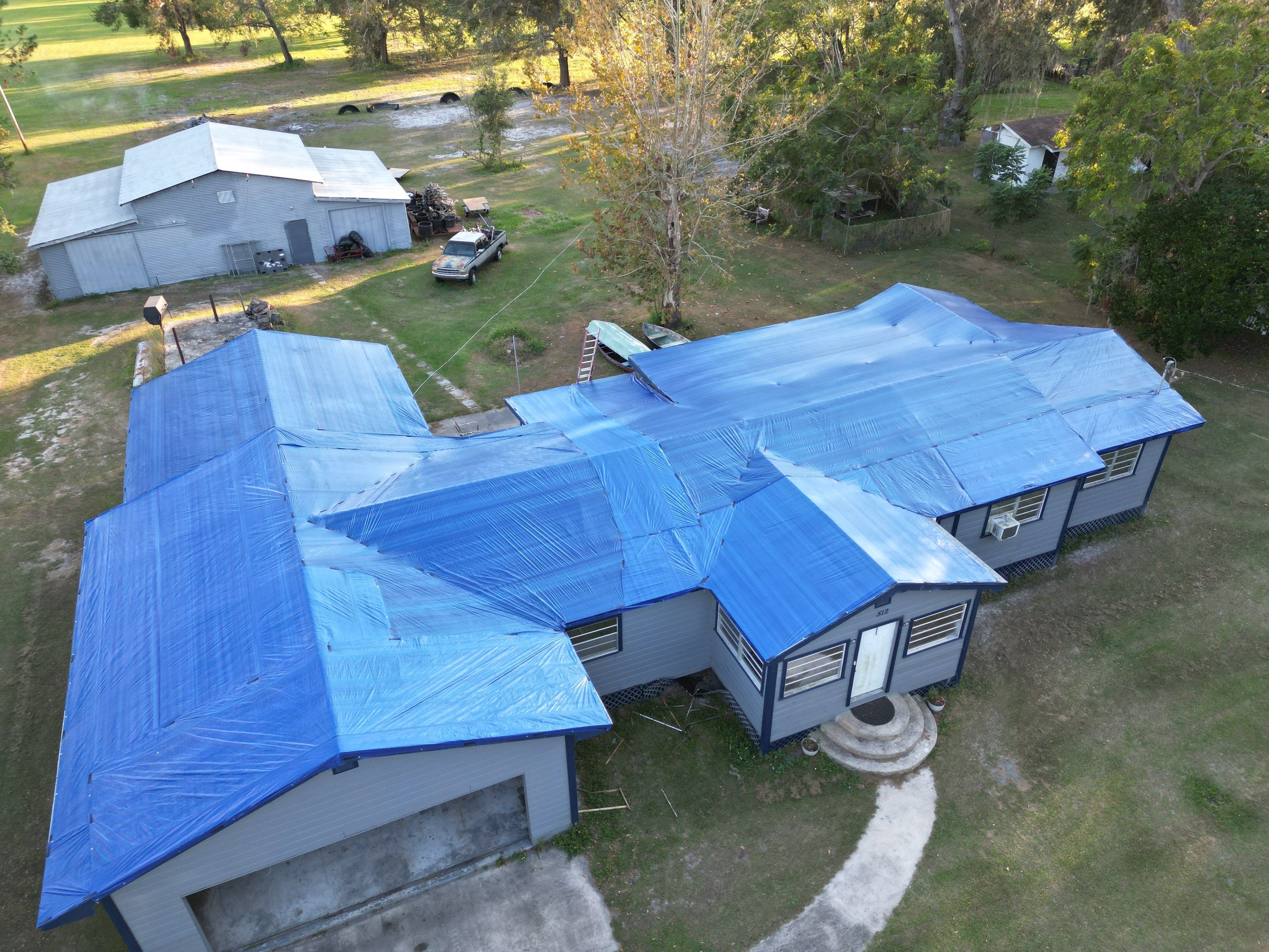 Tarp using TARP BLUE by AquaShield Restoration USA