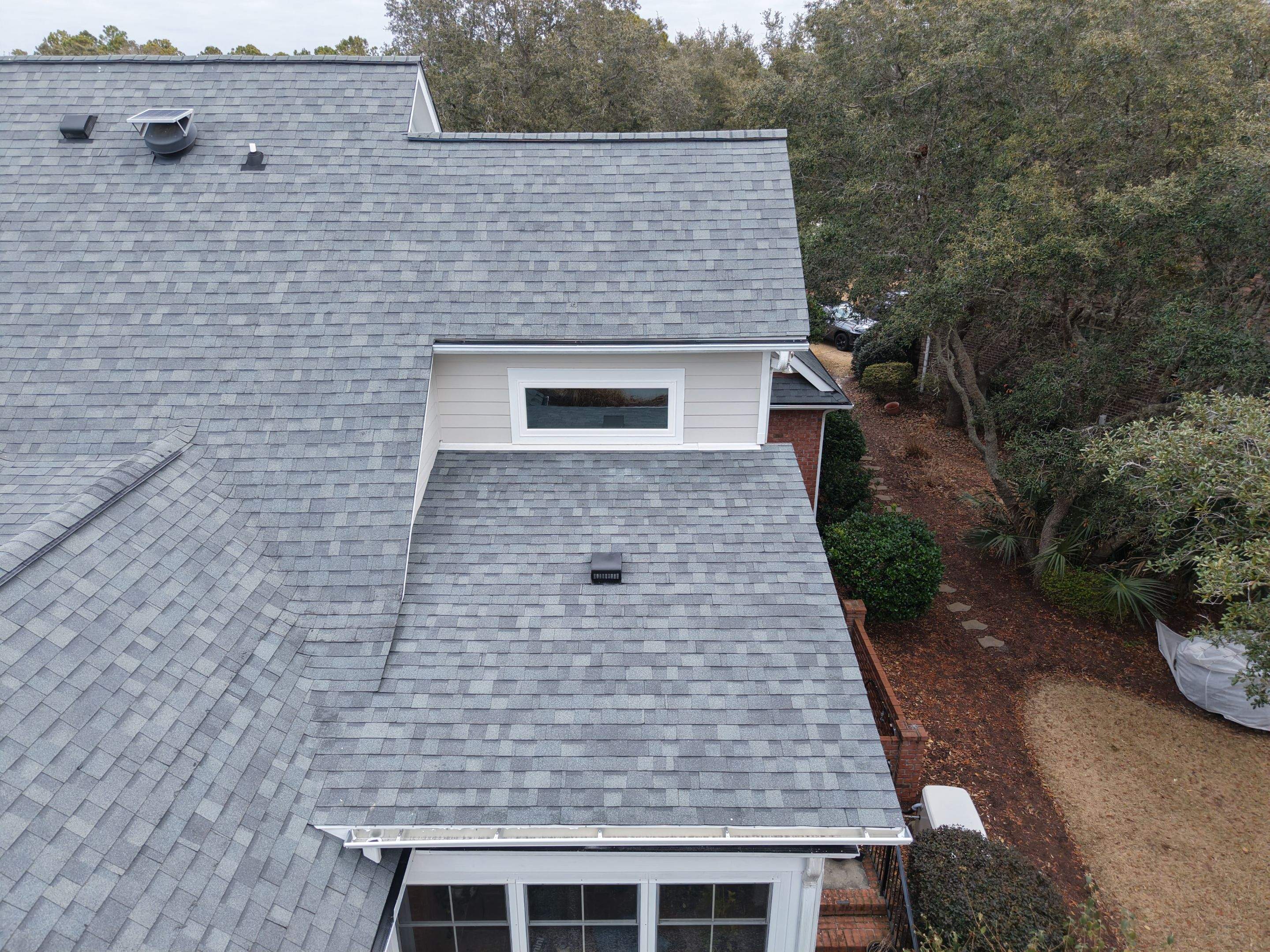 Deck Removal and Roof Addition in Winding River Plantation Bolivia NC by RGR Construction and Roofing, LLC