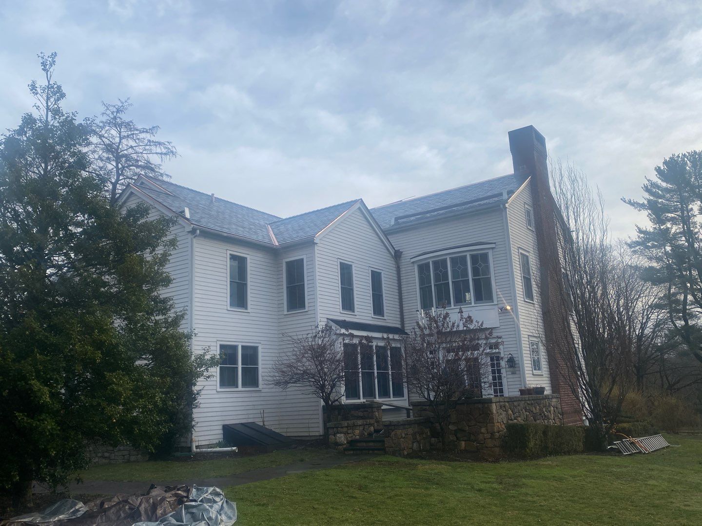 Residential Roofing Installation using Vermont Slate by A Plus Exterior