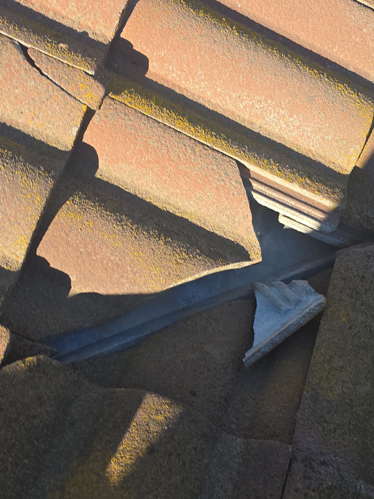 Tile Roof repair by Grandmark Service Company