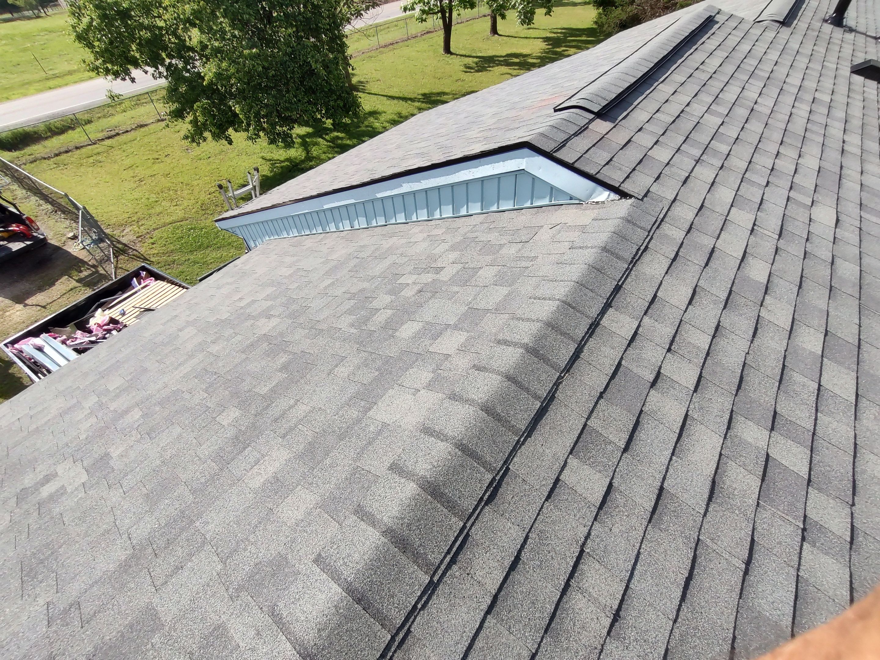 Roof replacement & Storm Door by In & Out Construction & Remodeling, LLC