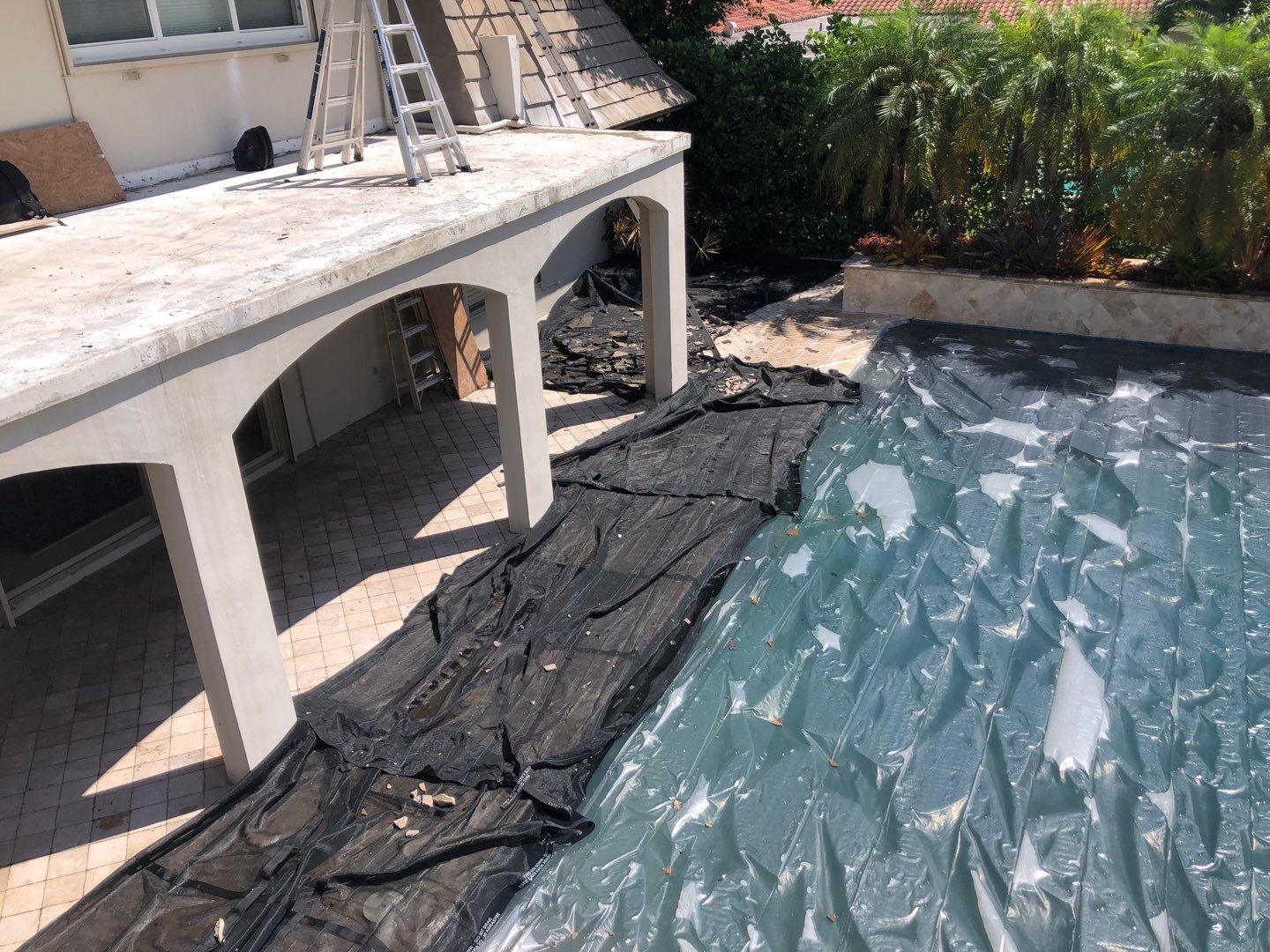 Amazing TPO flat deck re-roof with Eagle mansard in Hollywood Florida.  by First Due Roofing