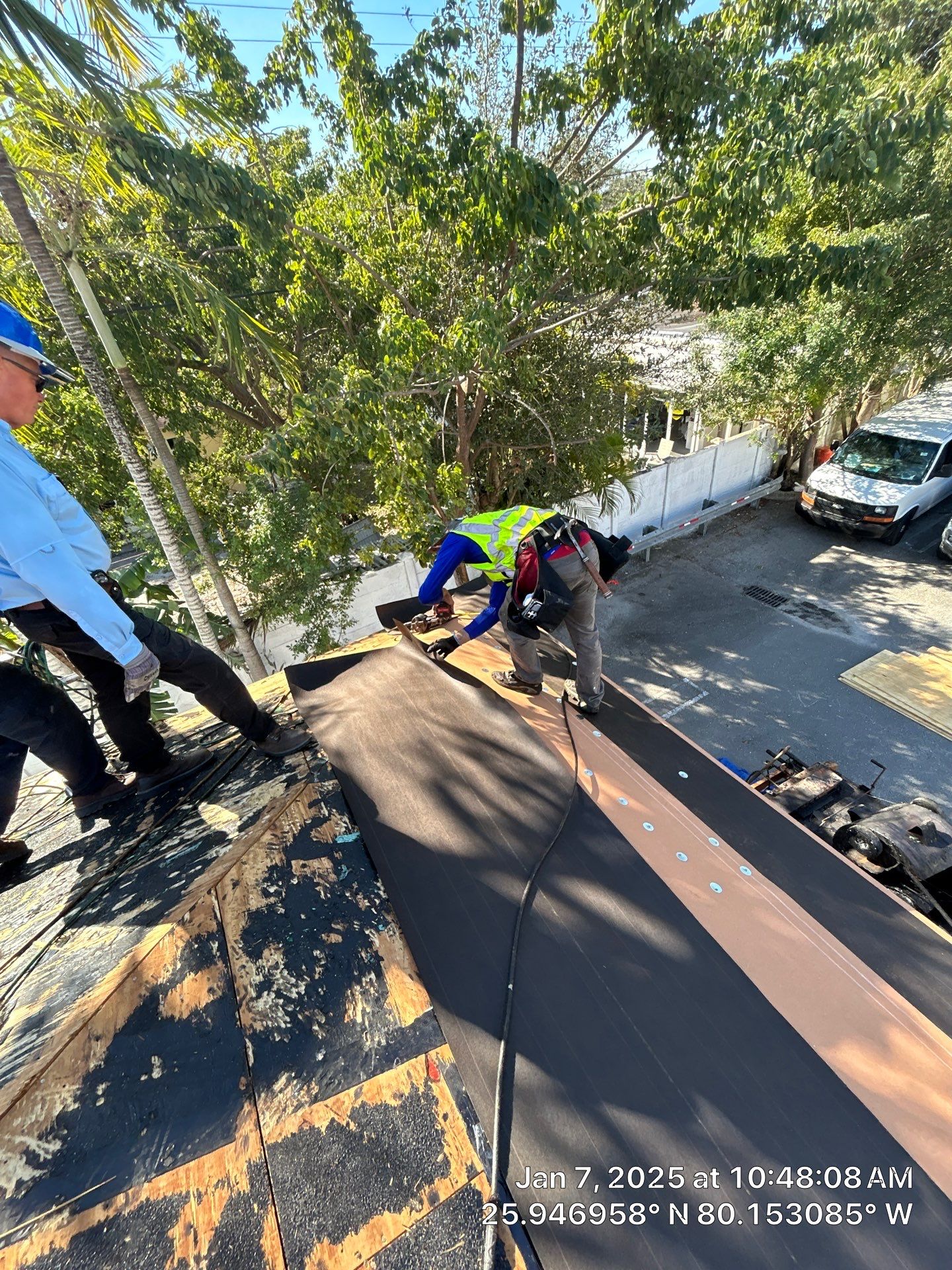 COMMERCIAL REROOF 24 GUAGE MEDIUM BRONZE 1-1/2" MECHANICAL SEAM "ZEBRA METHOD" by Earl W. Johnston Roofing 