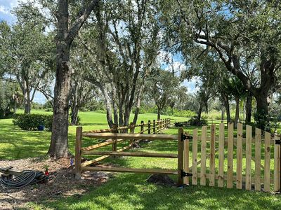 Wood Fence Installation using Wood 3 Rail Ranch Fence