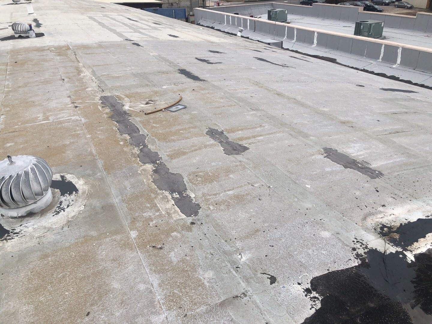 Spray foam and coatings using Conklin Benchmark/PUMA XL coatings and spray foam by Straight Edge Roofing Inc
