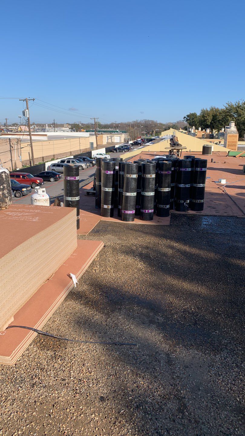 Apartment Roof Replacement by First Out Roofing 