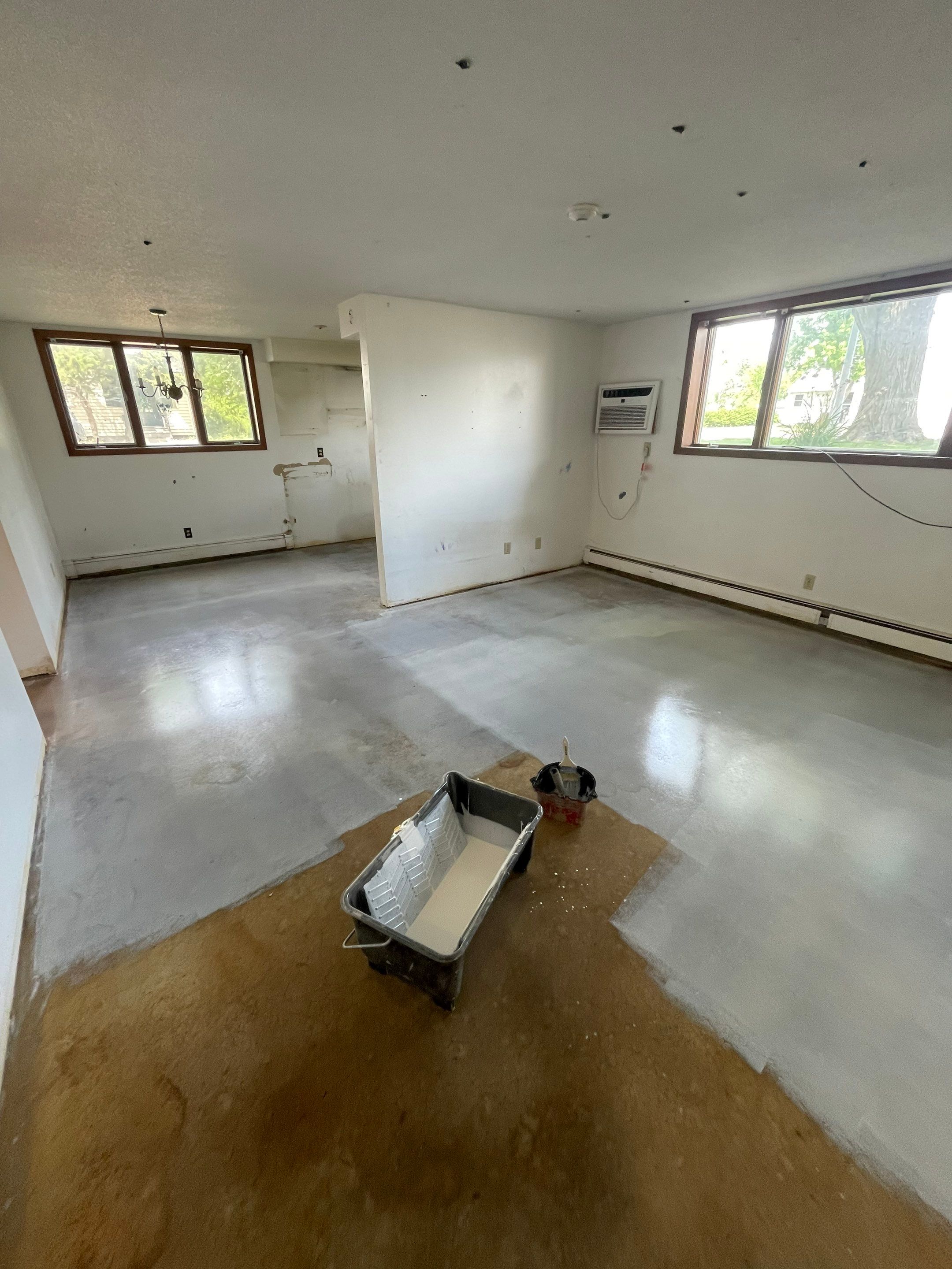 Commercial Subfloor Preparation and Flooring Restoration in Sioux Falls by Select Painting, Coatings & Garage Cabinets