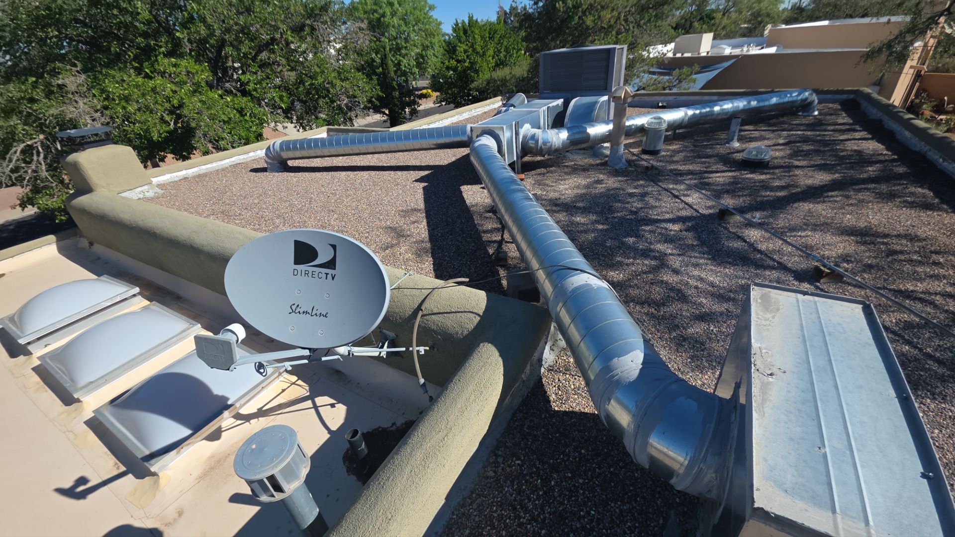 Tar and Gravel Roof Maintenance and Penetration Sealing in Albuquerque by Doyle Roof Masters Inc