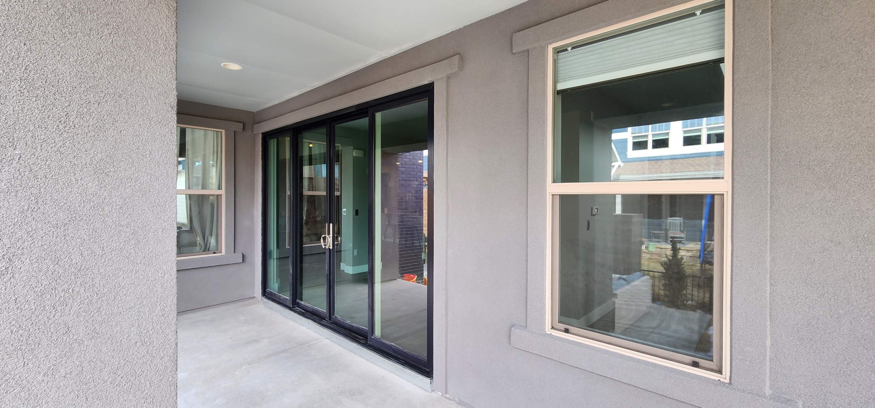 Open your space up to the outside! 4 Panel Patio door replacing 2 windows by 1st choice windows and siding
