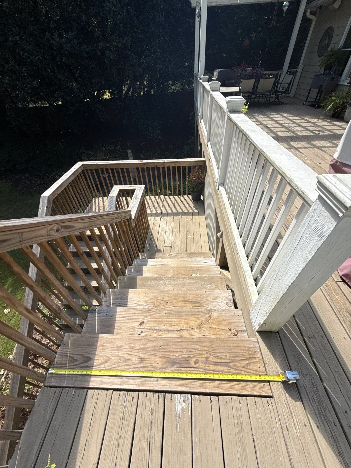 Deck Resurface and Screened-In Porch Build with Timbertech LED Lantern Post Cap Lights by Nelson Exteriors