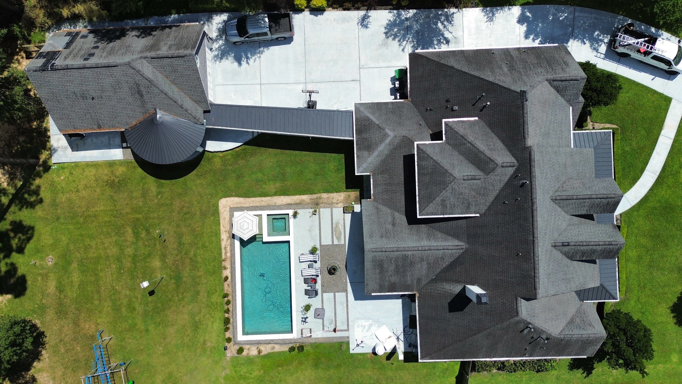 Huffman Roof Repair and Concrete Addition by Modern BYLT Roofing & Construction