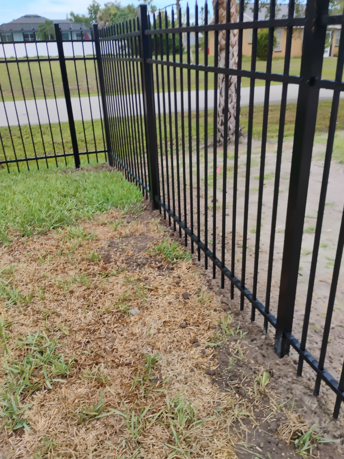 Black Aluminum Spear Top Picket Fence Installation in Englewood by True Fence LLC