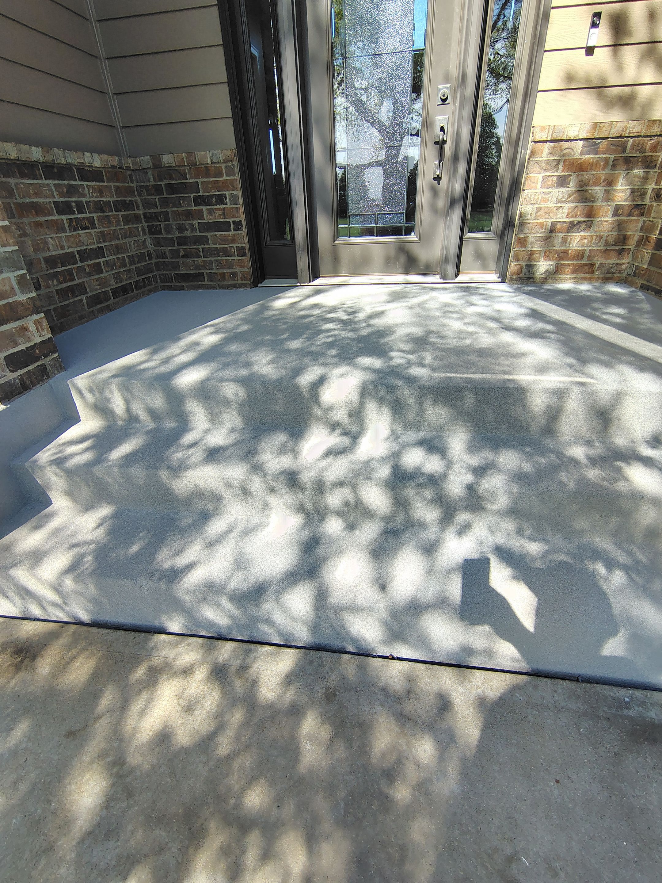 Front Porch Concrete Coating and Restoration in Harrisburg by Select Painting, Coatings & Garage Cabinets