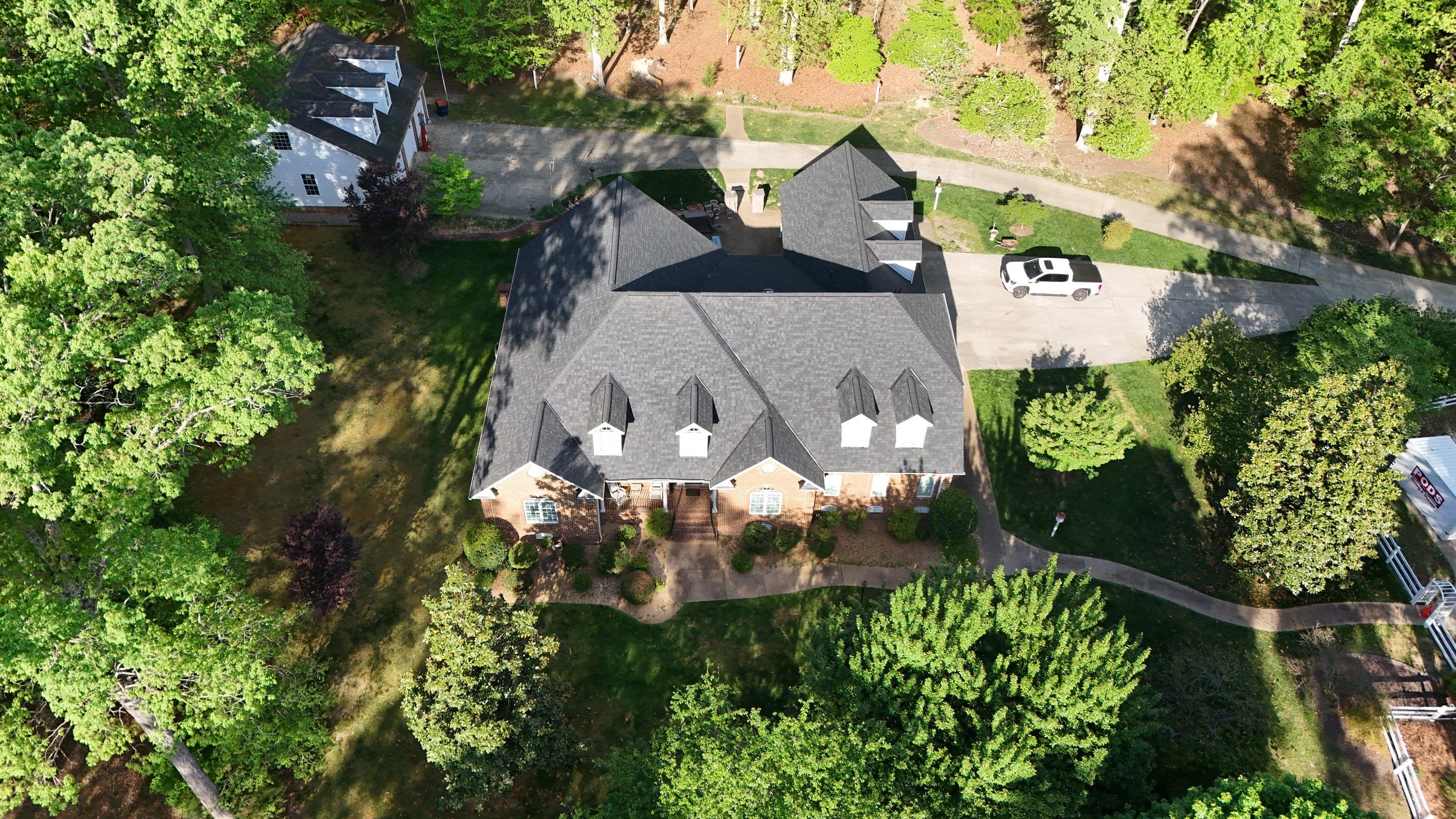 Comprehensive Roof and Gutter Replacement After Tree Damage in Midlothian by Cade Construction