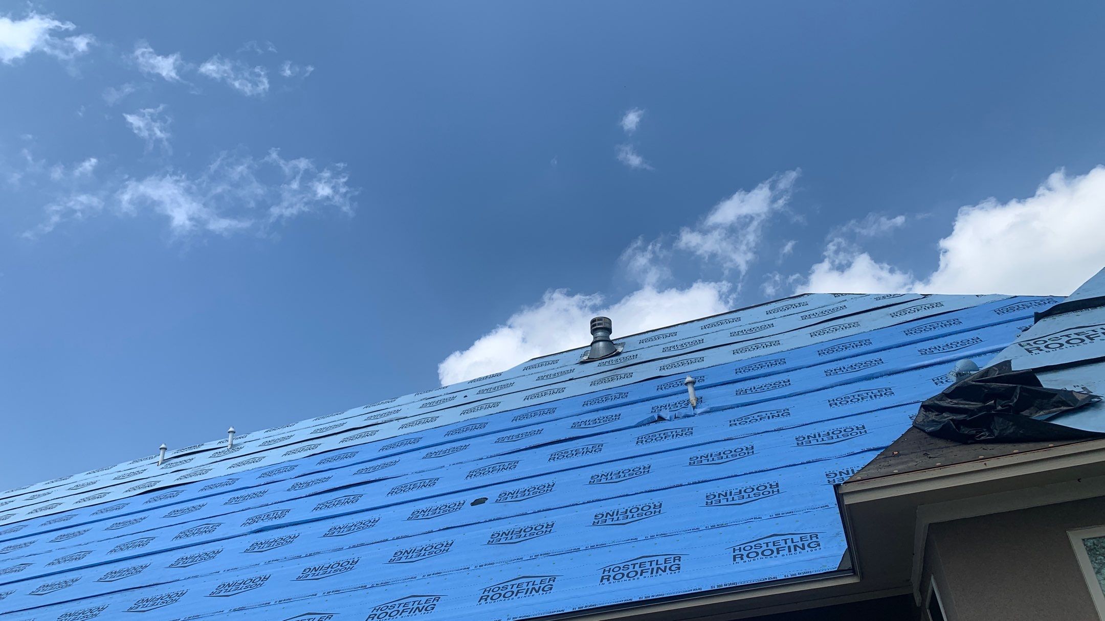Residential Roofing Installation using Malarkey Architectural Vista Shingles by Hostetler Roofing