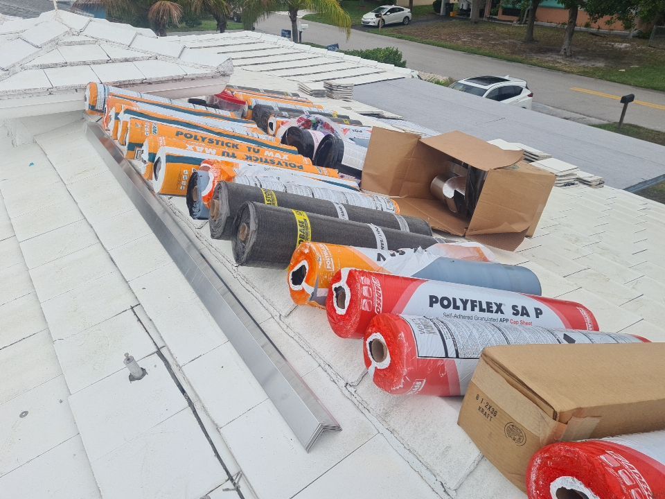 Residential Roofing Installation using 1" Nail strip metal roof by BLUES BROTHERS ROOFING