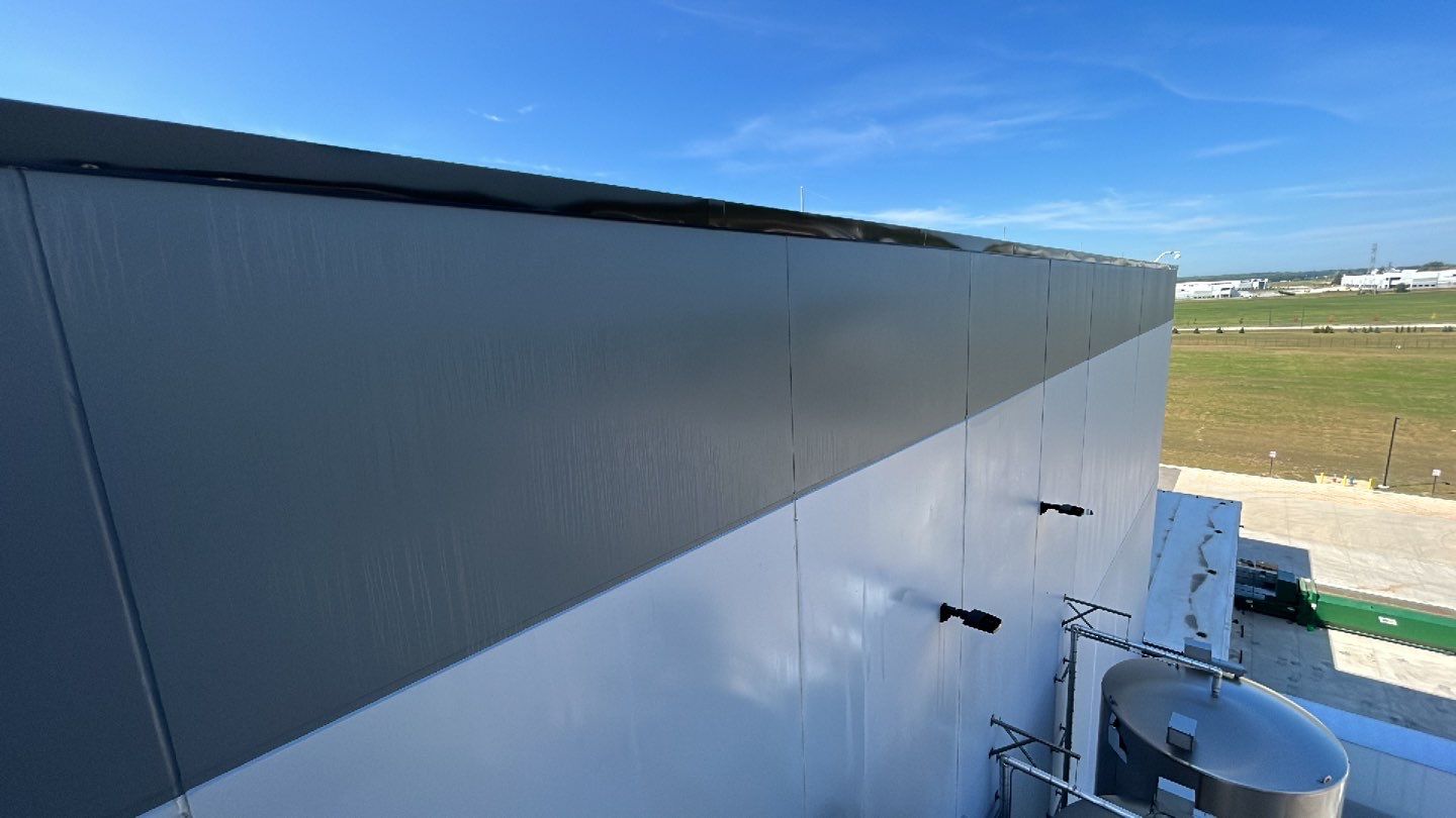 Oil removal using hot water and environmentally friendly degreaser by Northern Power Washing LLC.