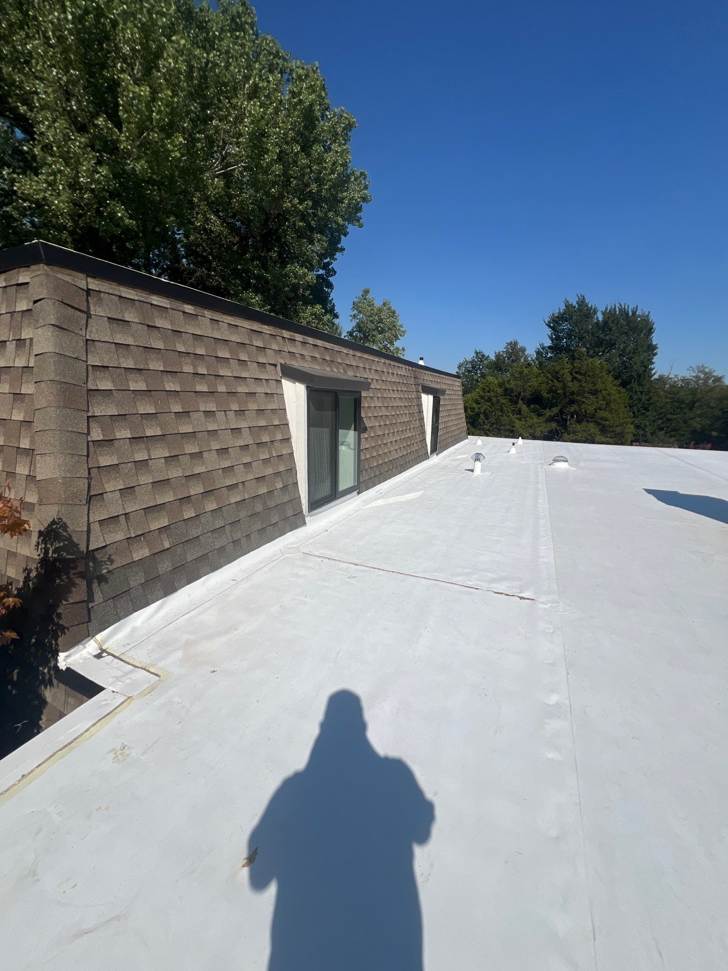 TPO Flat Roof Replacement in Edmond, OK by McCann's Roofing and Construction