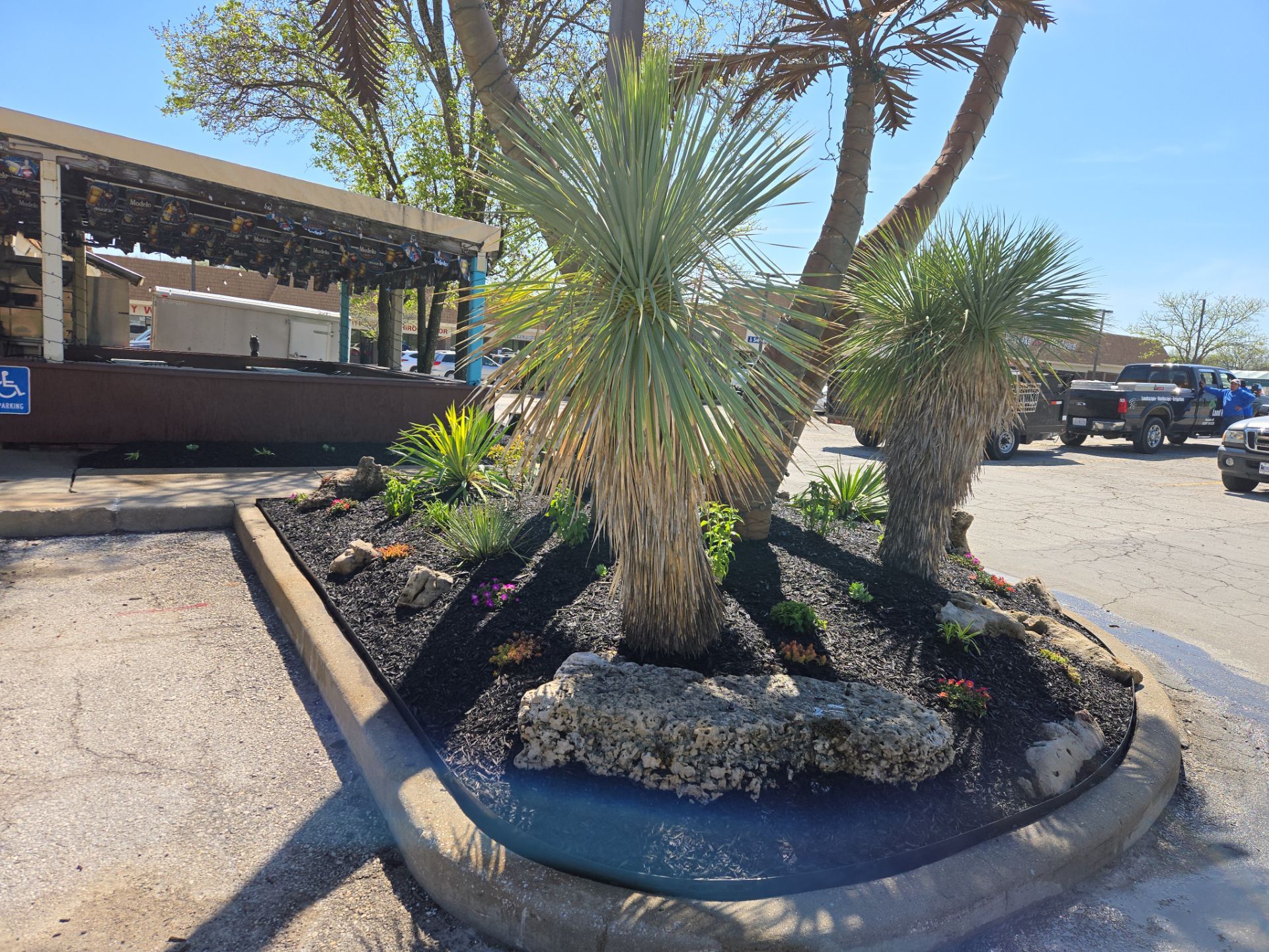 Restuarant Landscape Installation and Parking Lot Islands in Lenexa by LAND ESCAPES LLC