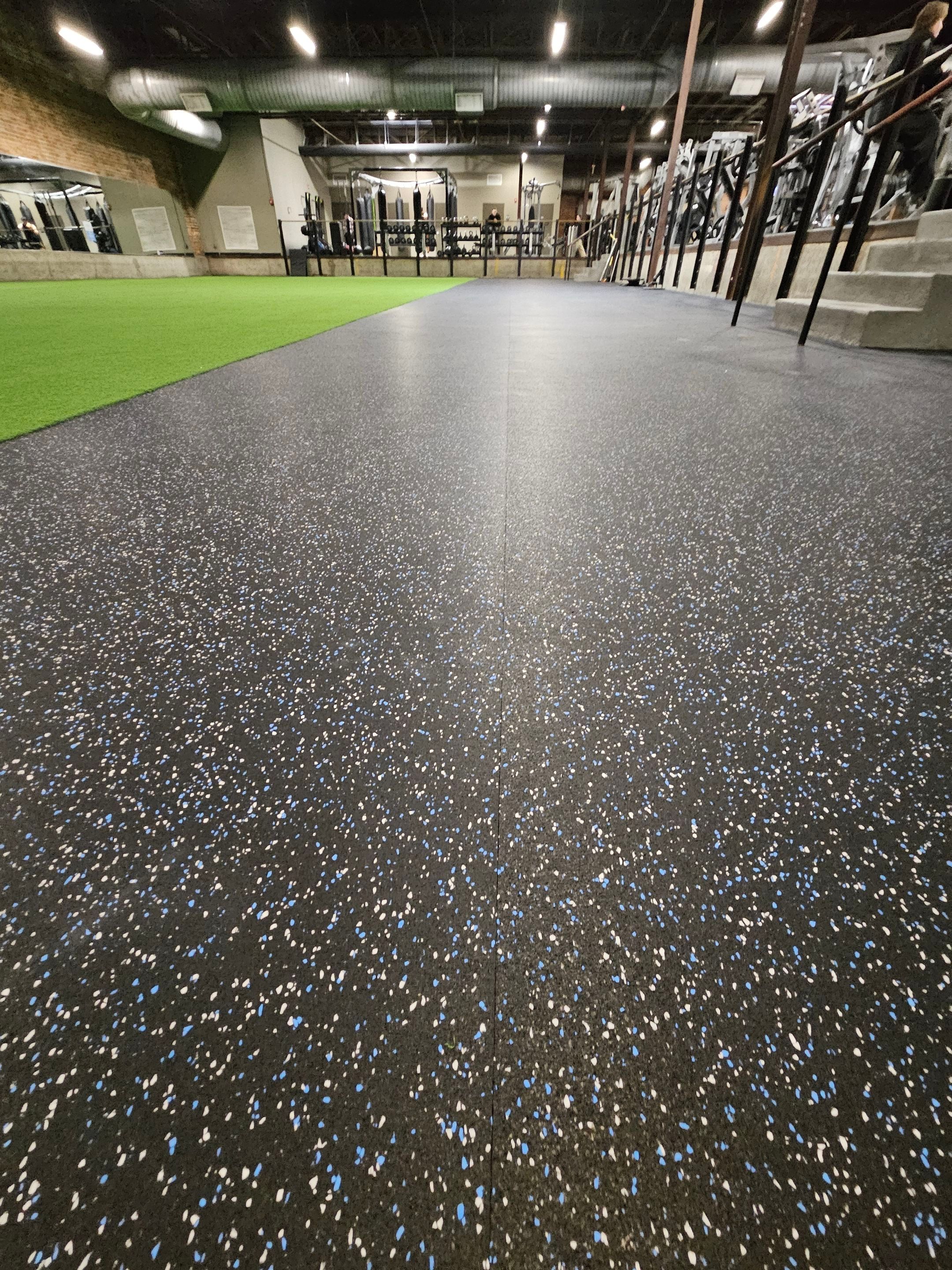 Norfolk OLF - Strength area turf, rubber installation and front desk by Nova HomeWorks 