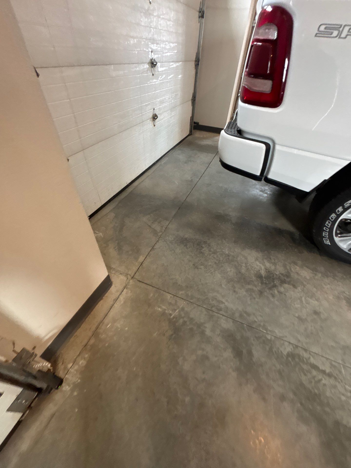 Multi-Car Garage Concrete Coating and Crack Repair in Dell Rapids by Select Painting, Coatings & Garage Cabinets