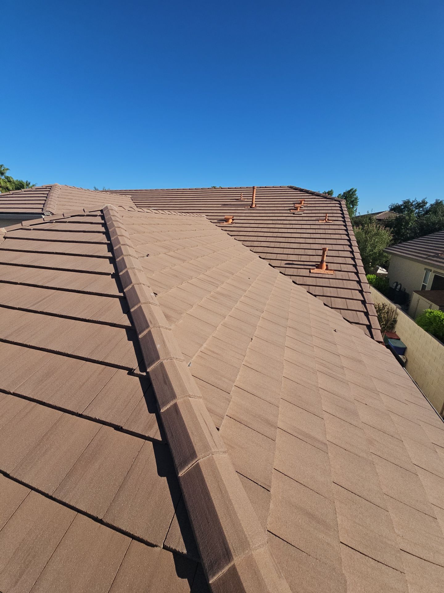 Residential Roofing Installation using Concrete Tile by Weather-Tite Exteriors LLC