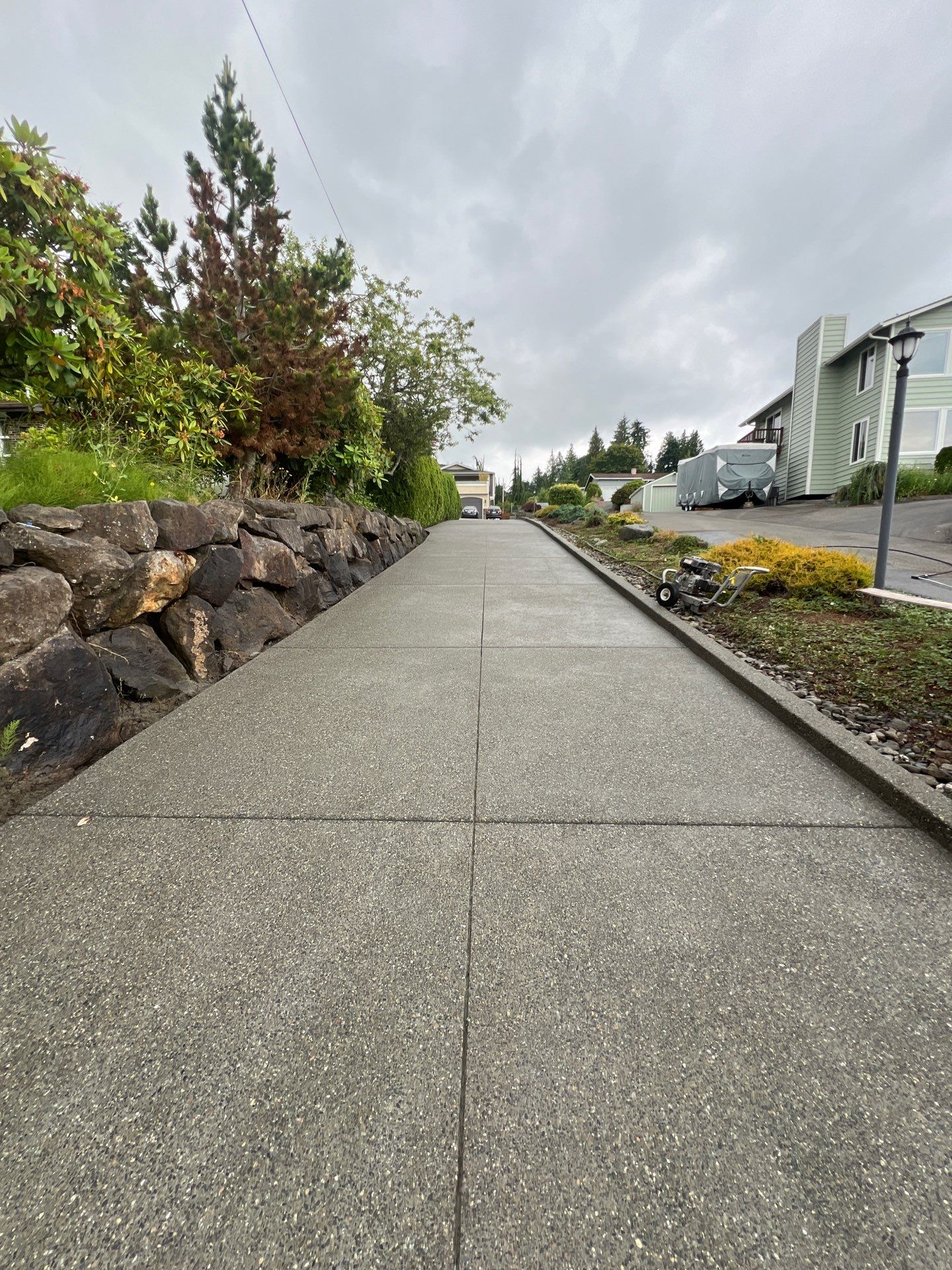 Concrete Driveway Makeover w/ Asphalt Patch | Everett  by Jireh Asphalt & Concrete Inc 