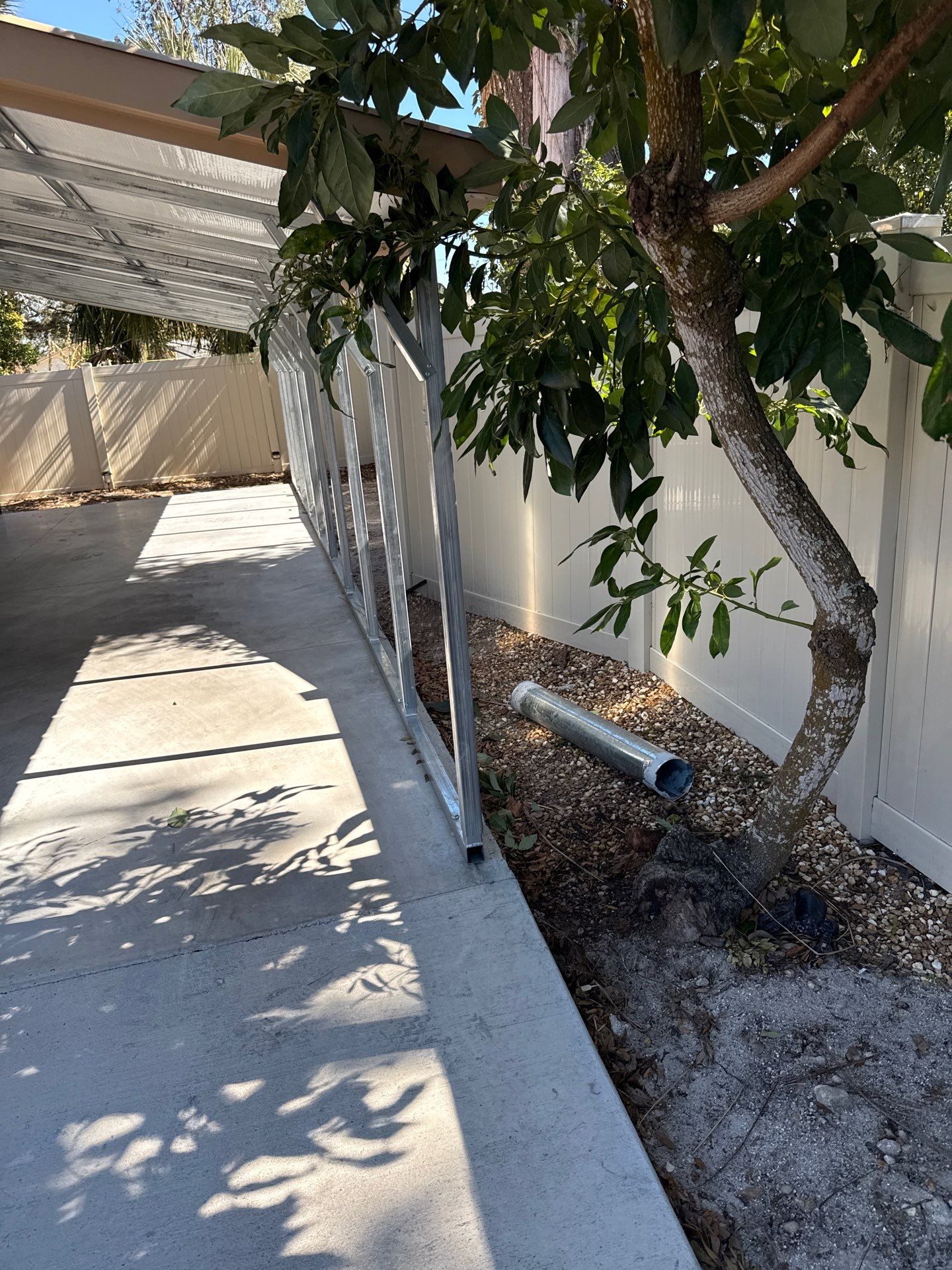 White 6-inch K-style Gutters and Down Spouts using Seamless Gutters White Down Spouts in Tampa FL by Gutter Professors