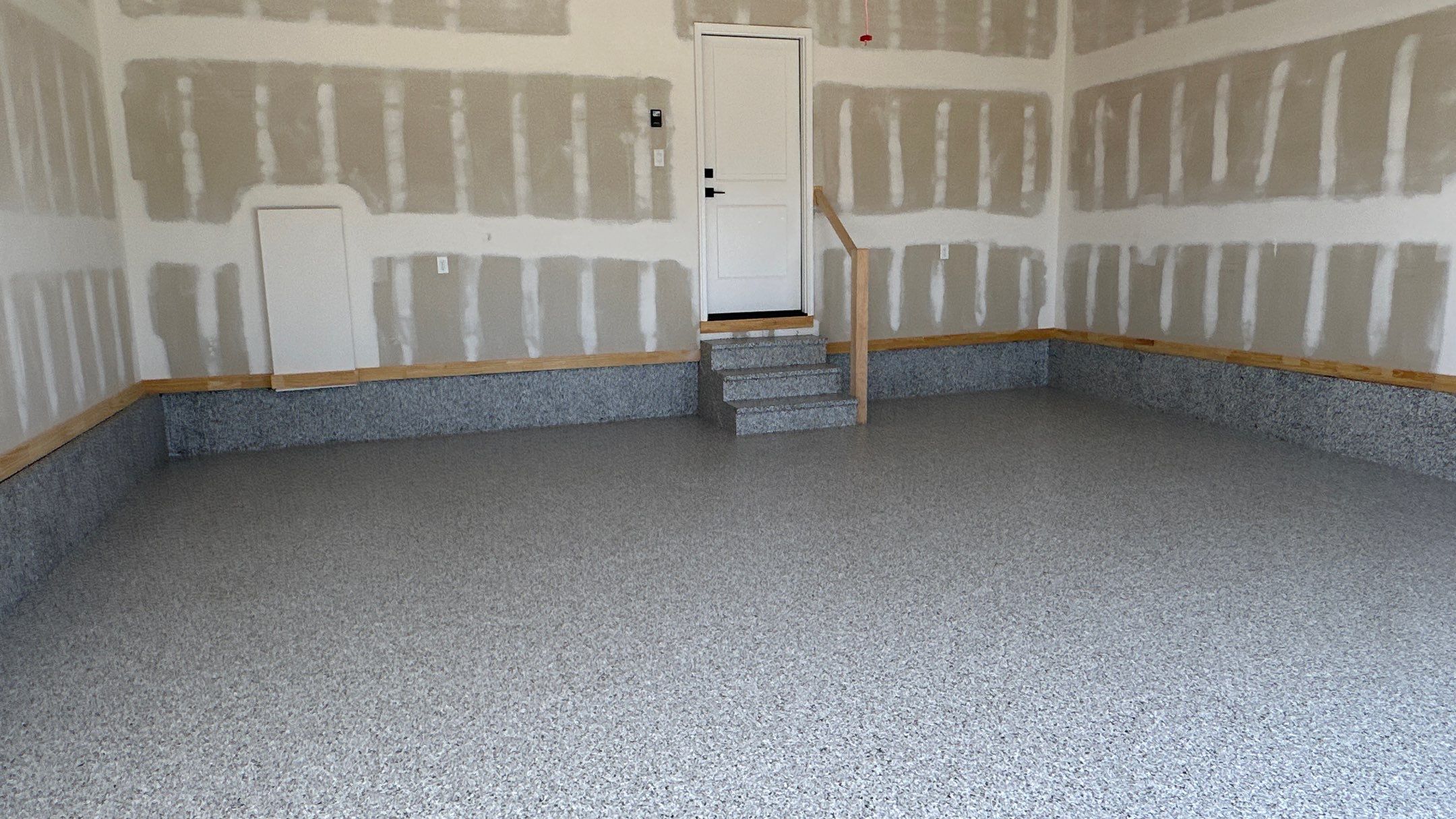 Phil B. new floor with Coyote flake by Banner Garage