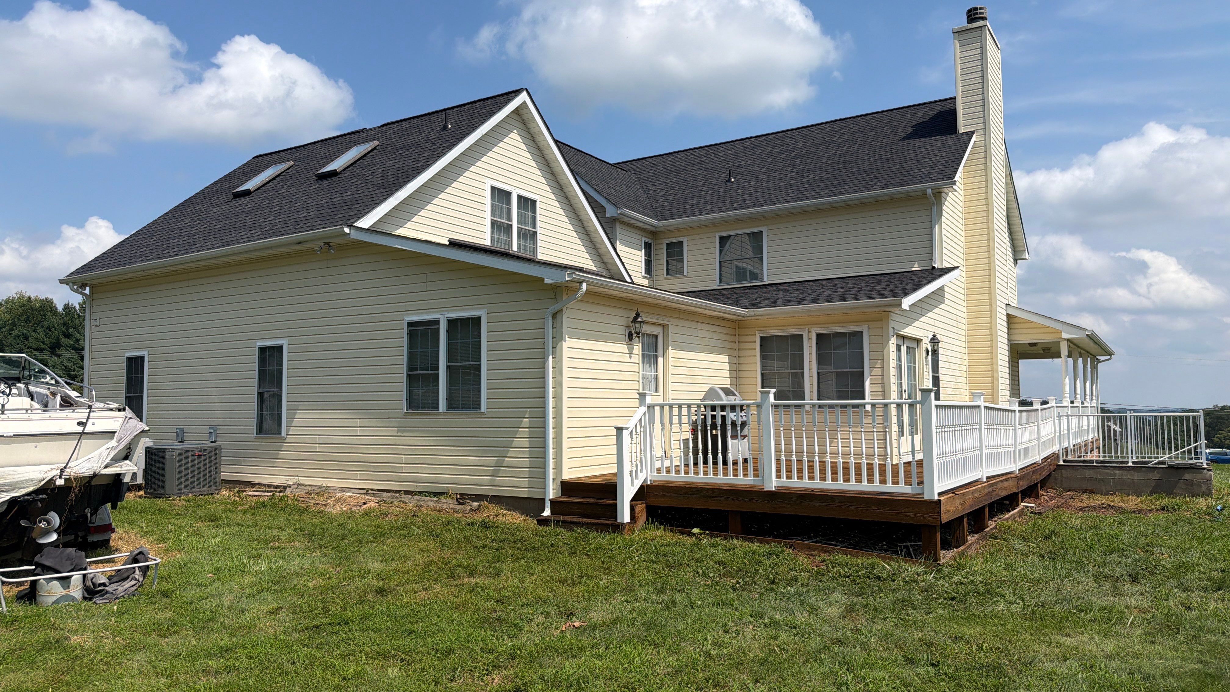 Vinyl Siding House Washing and Wood Deck Restoration in Carroll County by Baltimore Pressure Washers Inc.