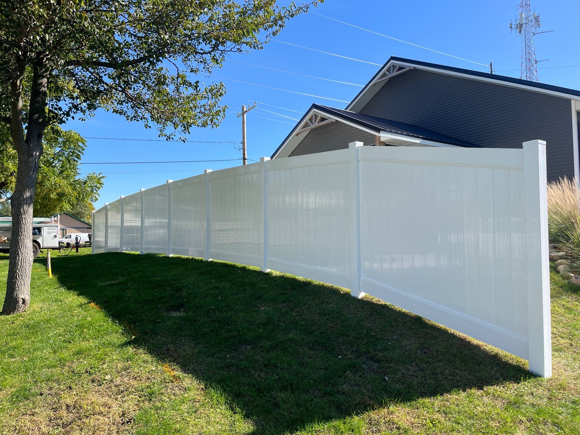 White Vinyl Privacy Fence Installation in Grundy Center by Perfect Picket Fence and Stain