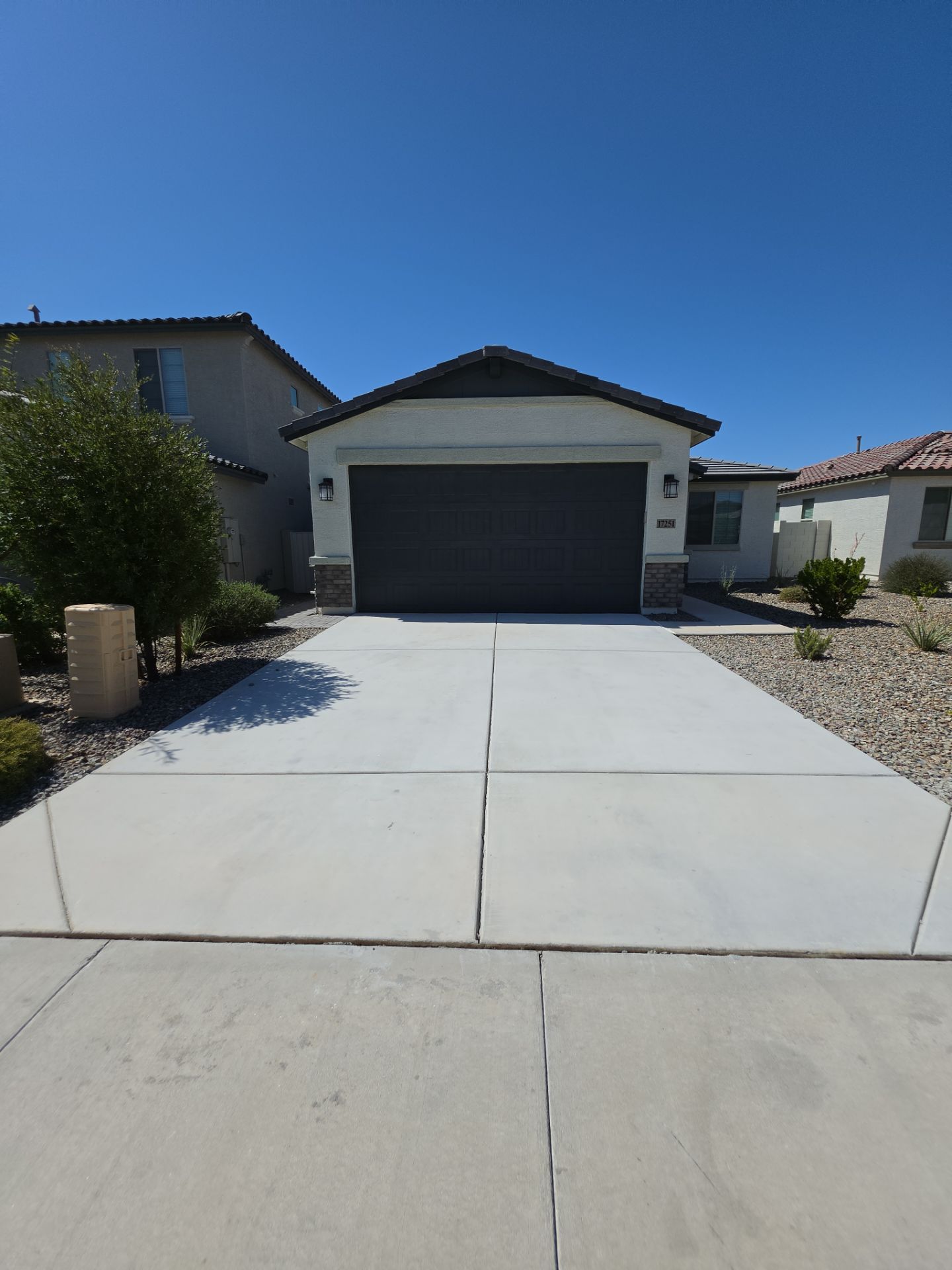 Driveway Oil Stain & Rust Removal | Surprise, AZ 85388 by Patriot Power Washing & Sanitation