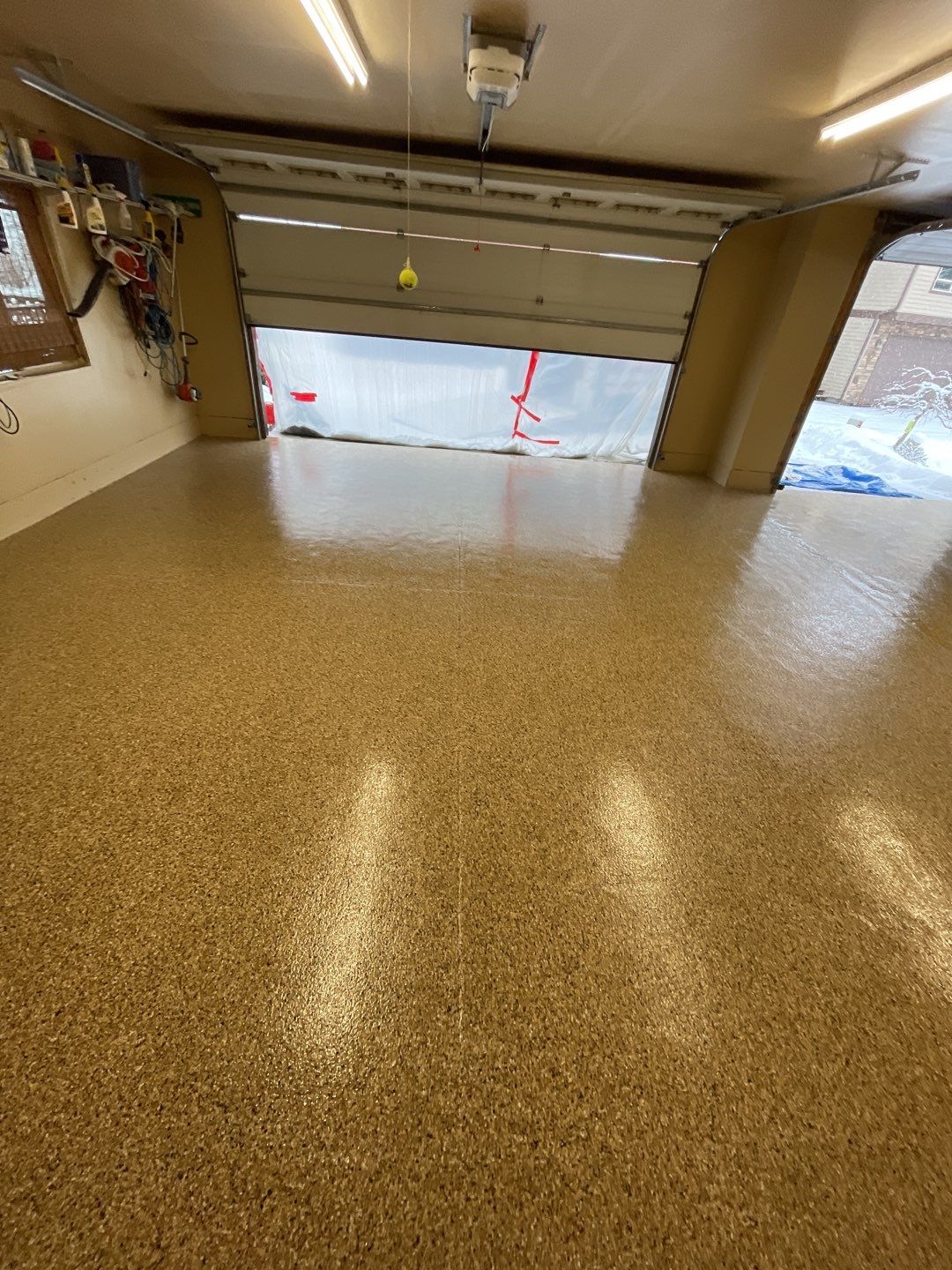 Garage Transformation using Sandstone by Croc Coatings, LLC