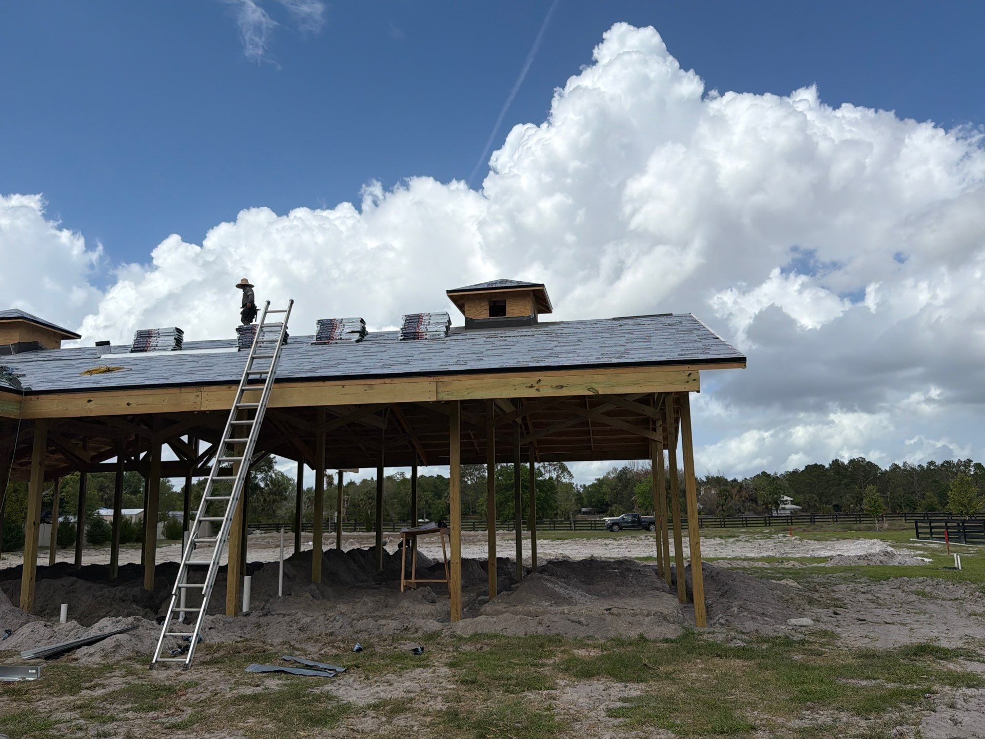 Custom Post-Frame Horse Barn and Shingle Roof Installation in Geneva by Fortified Roofing Solutions Corp.