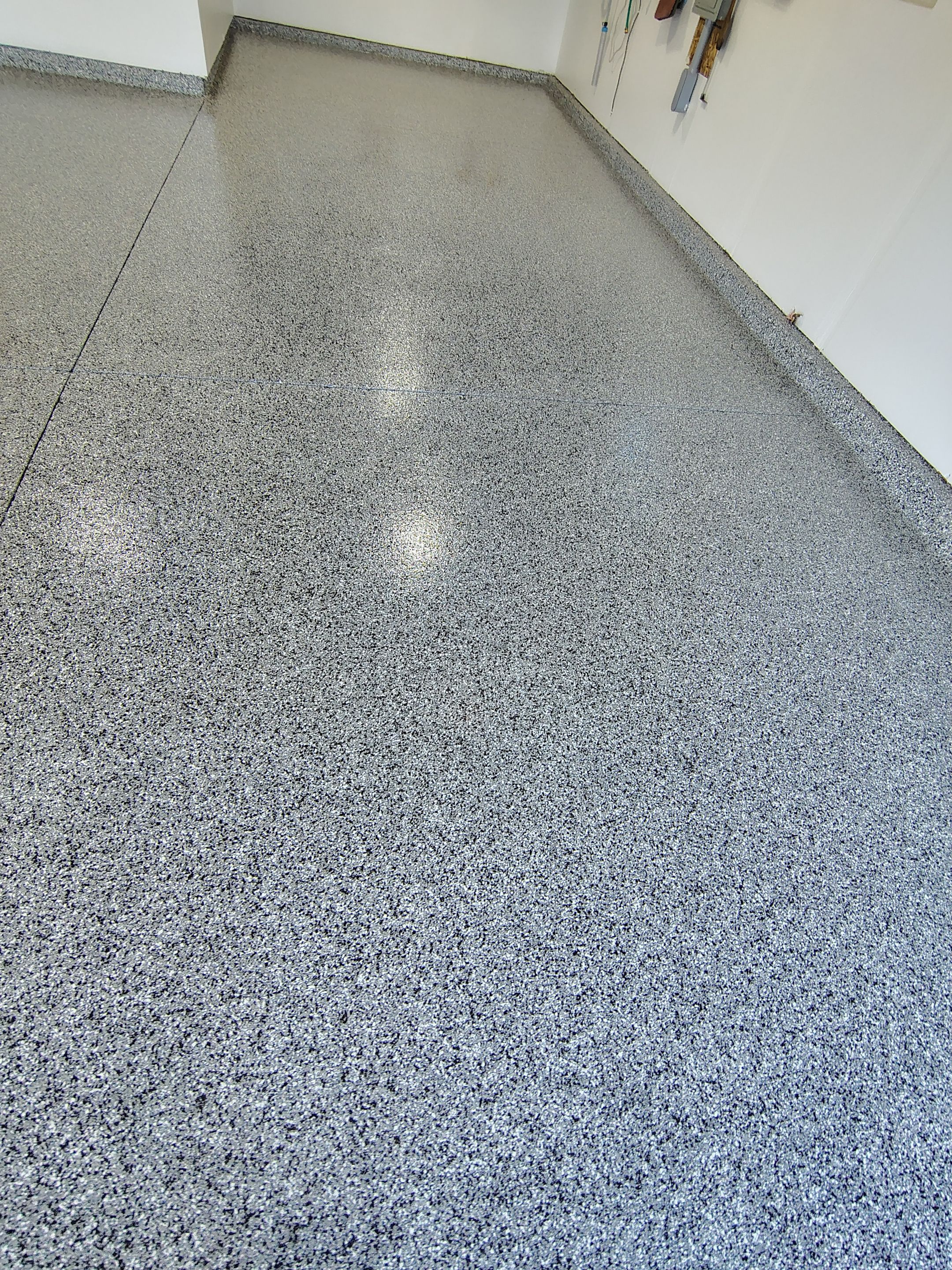 Decorative Flake Garage Floor Coating Installation in Tea, South Dakota by Select Painting, Coatings & Garage Cabinets
