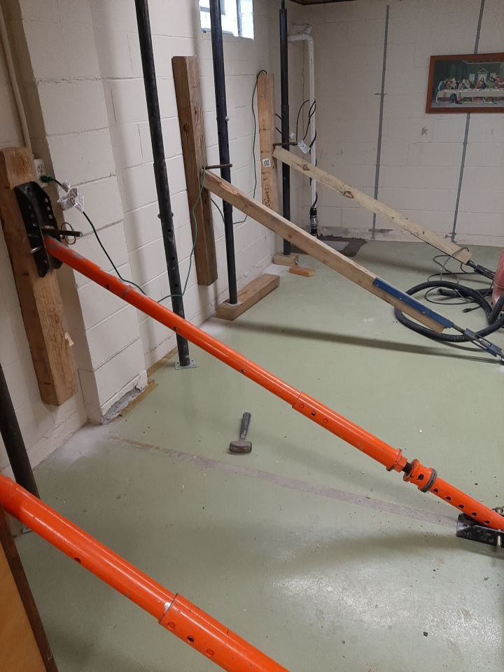 Wall Straightening and Reinforcement using Embedded Fiber Reinforcement by Toledo Basement Repair 