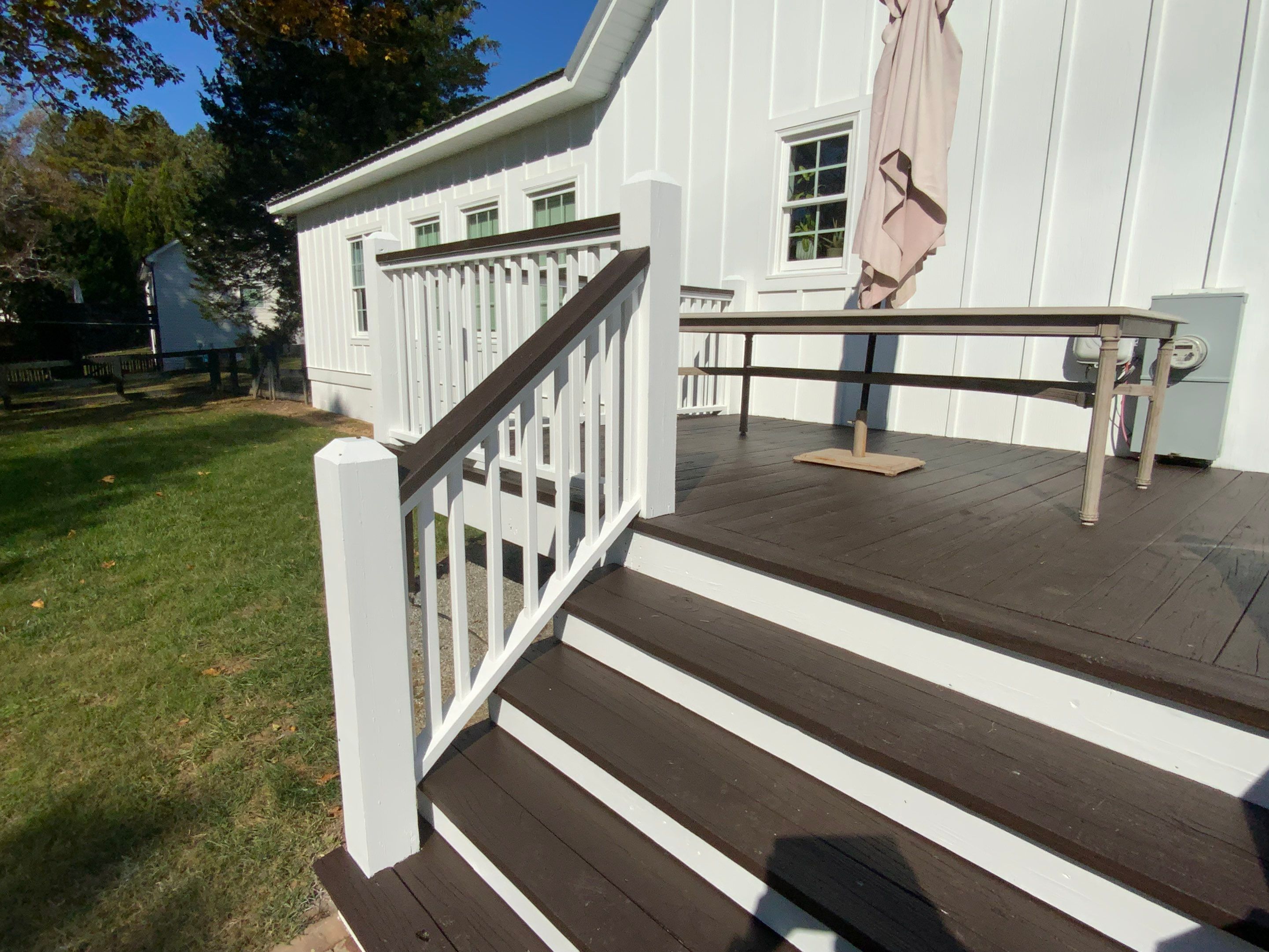 Exterior Trim Painting and Dark Deck Staining in Acworth by Swift Home Renovations
