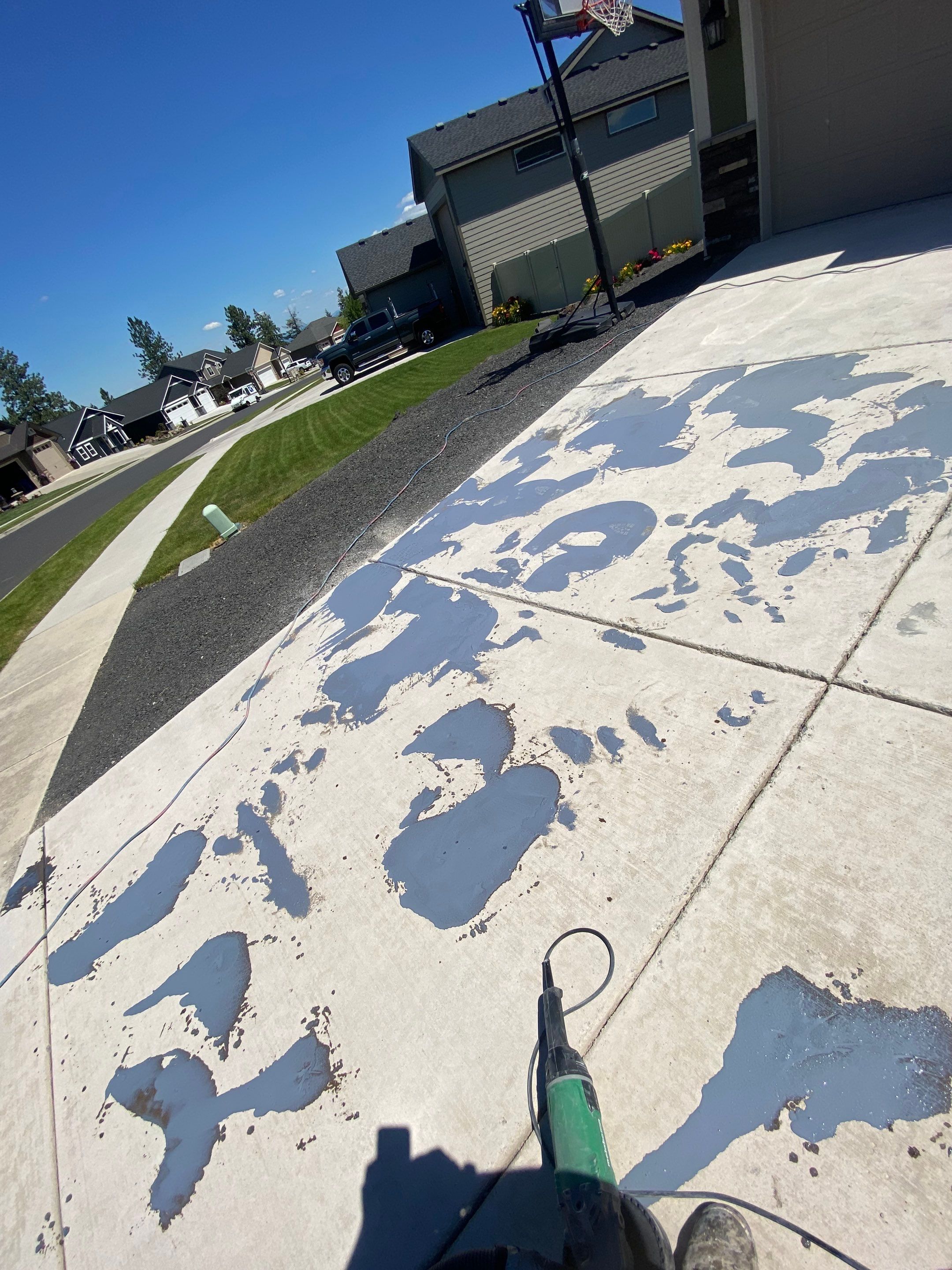 Driveway using Greystone 1/8" by Croc Coatings, LLC