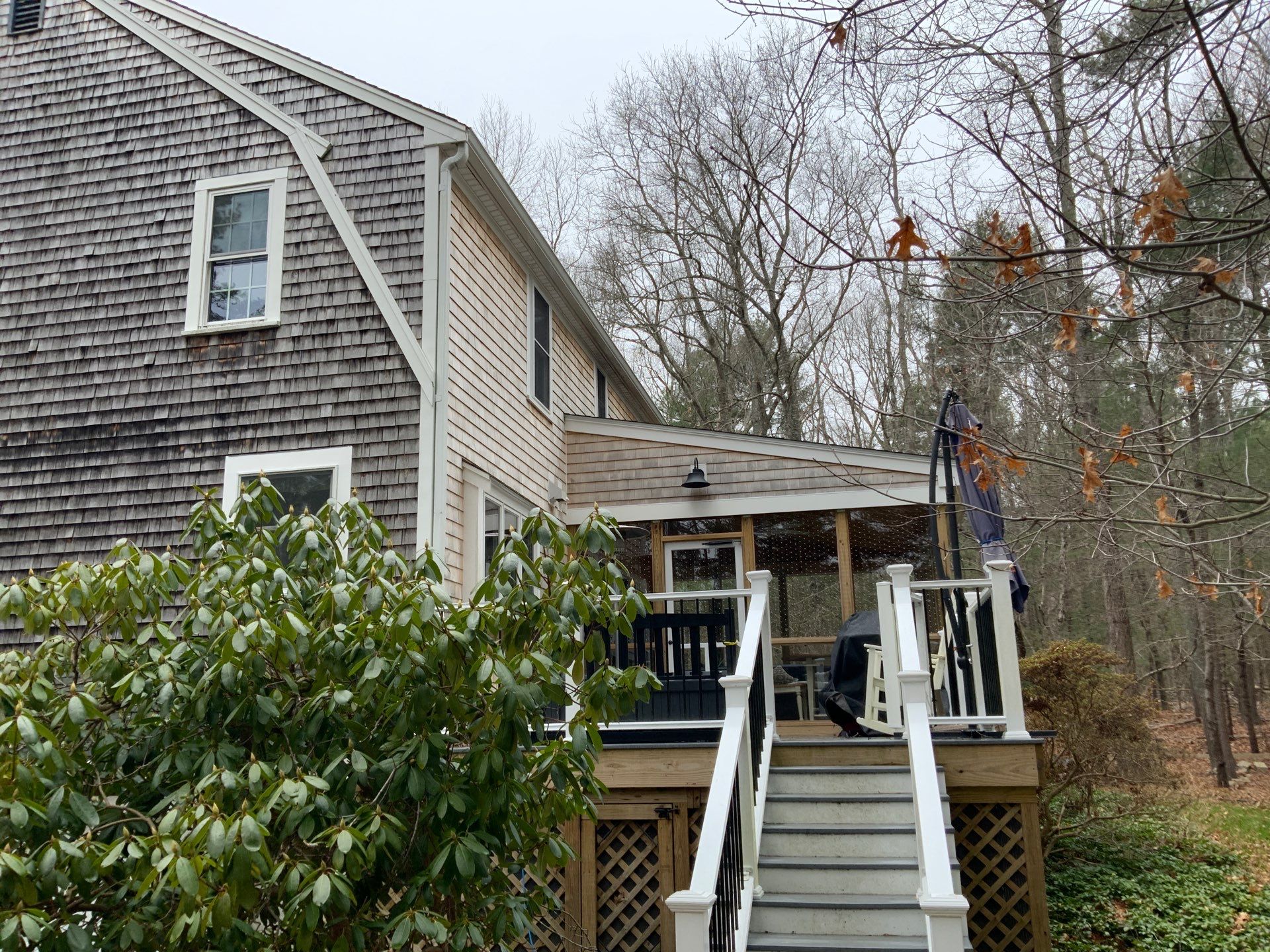 Partial residing project with Red Cedar shingles in Duxbury, MA by UBrothers Construction