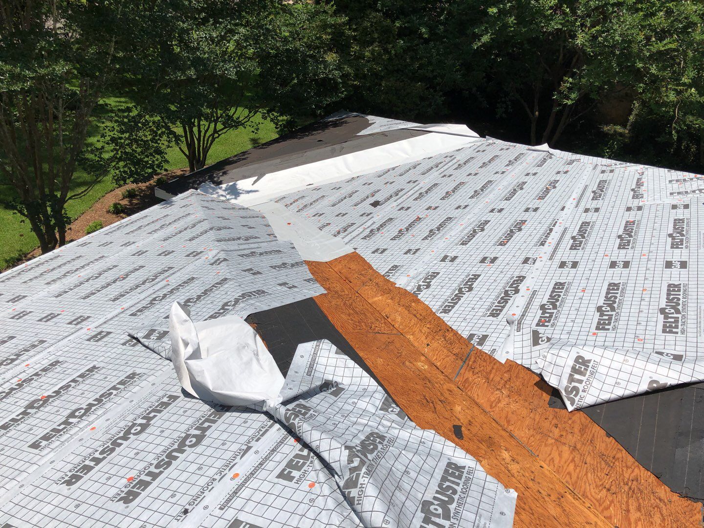 Residential Roofing Installation using Roof Replacement by American Roofing & Construction LLC