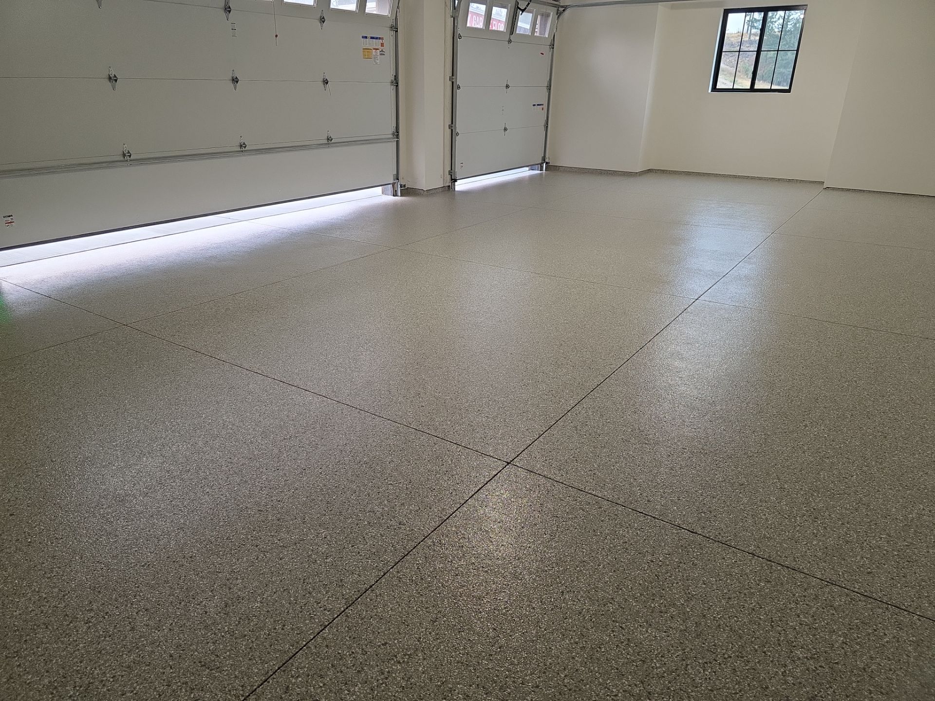 Garage Transformation using Mt Everest by Croc Coatings, LLC