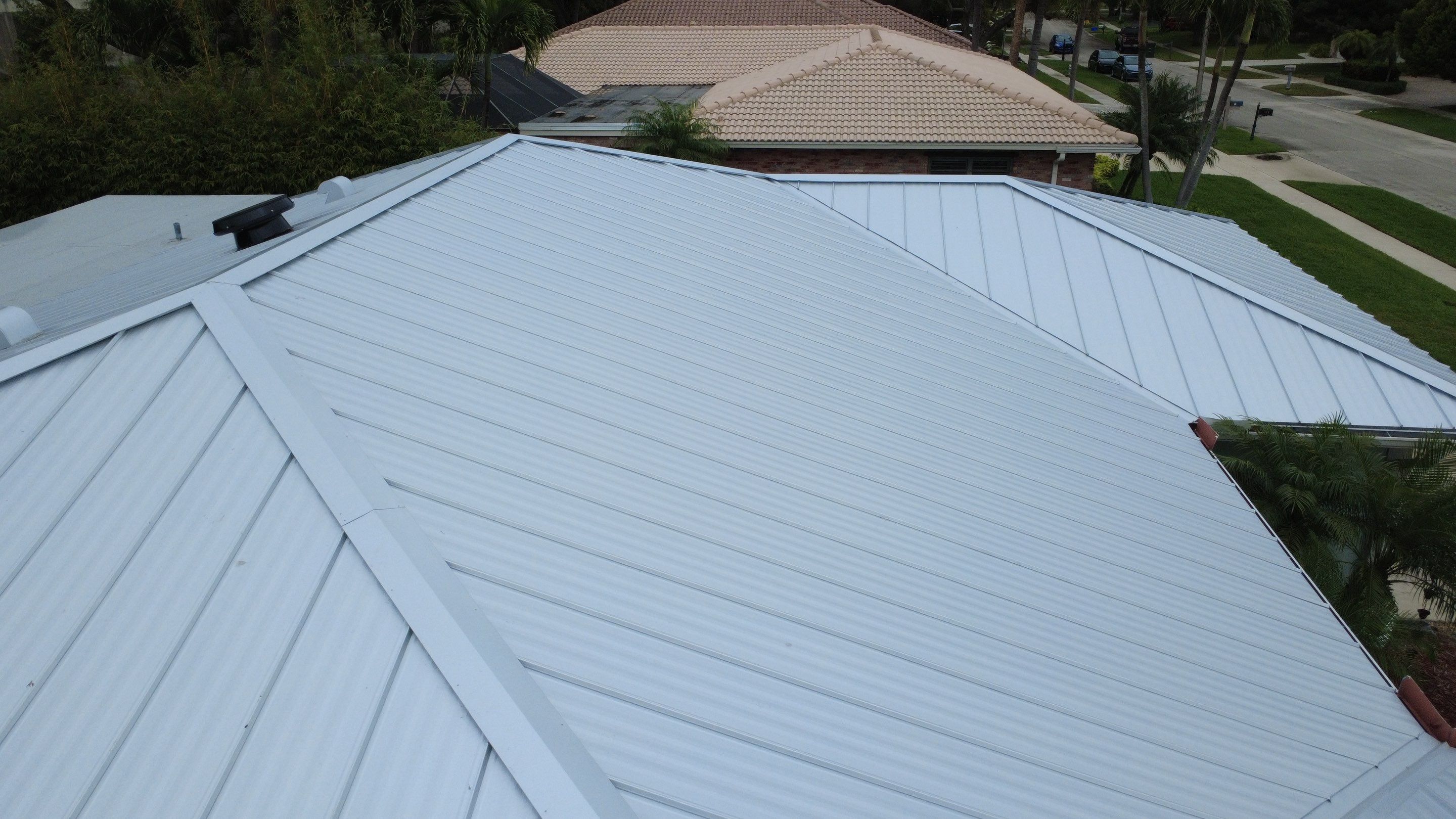 Residential Roofing Installation using 1" Nail strip metal roof by BLUES BROTHERS ROOFING