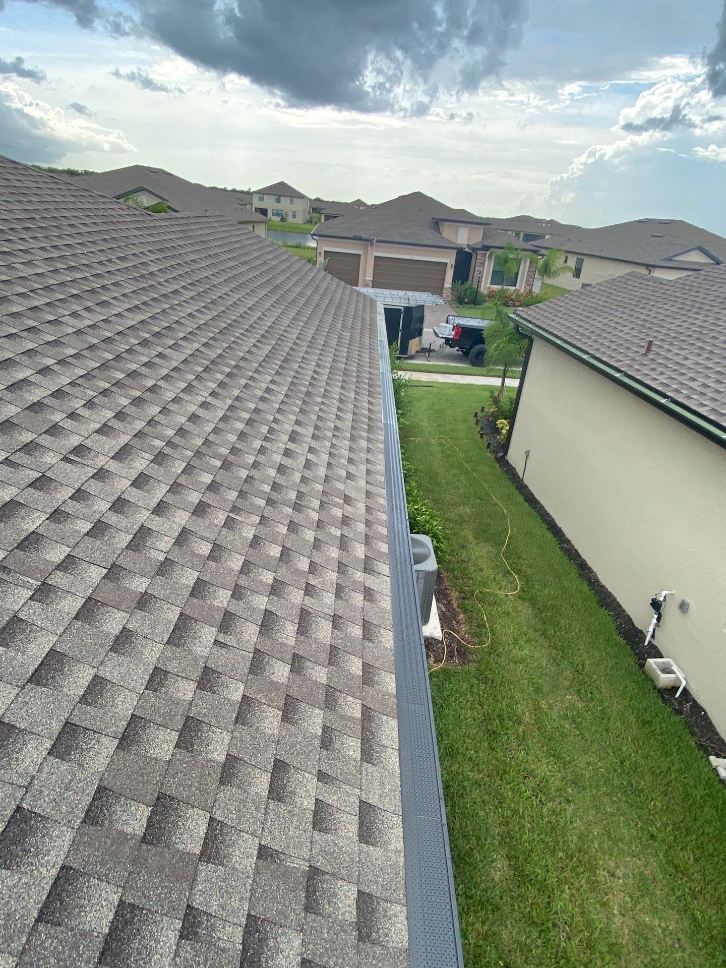 Brown Seamless Gutters for Homes in Fort Myers by Gutter Professors